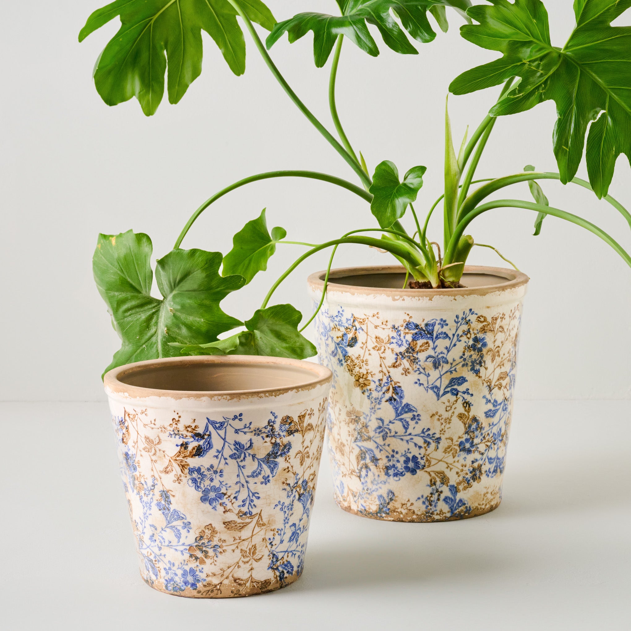 Blue and White Distressed Planters Items range from $48.00 to $68.00