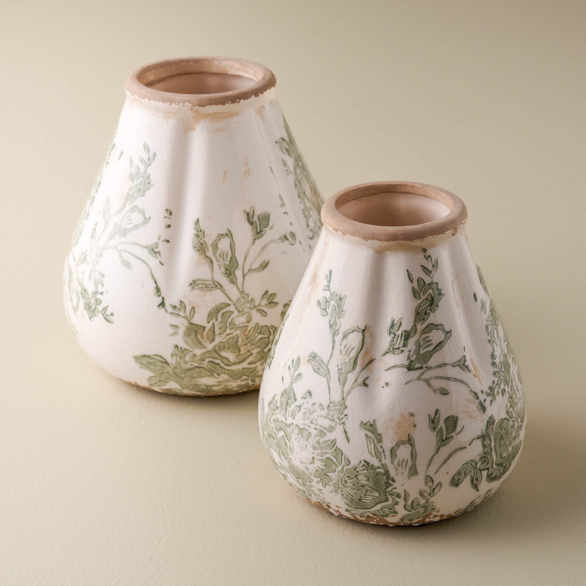 large and small sized Fluted Green and White floral Distressed bud Vases Items range from $18.00 to $28.00