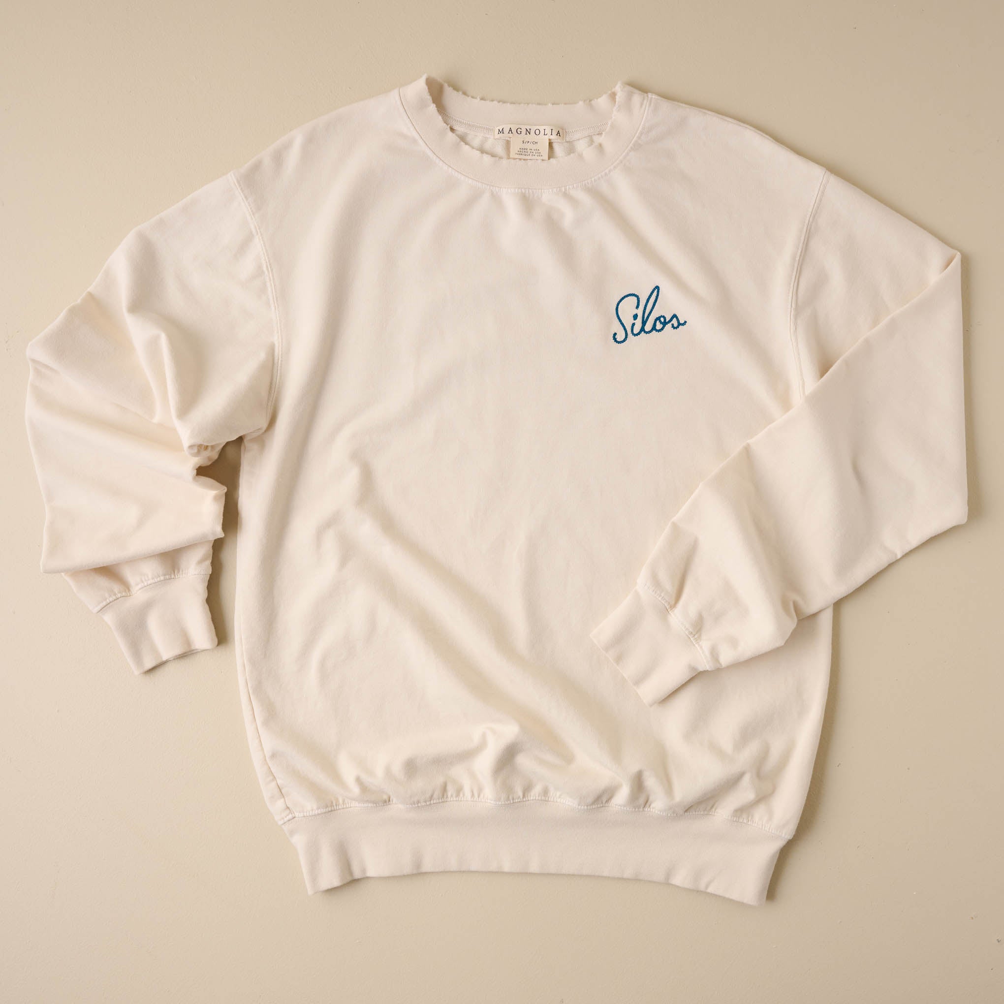 Embroidered Silos Ivory Sweatshirt On sale for $51.20, discounted from $64.00