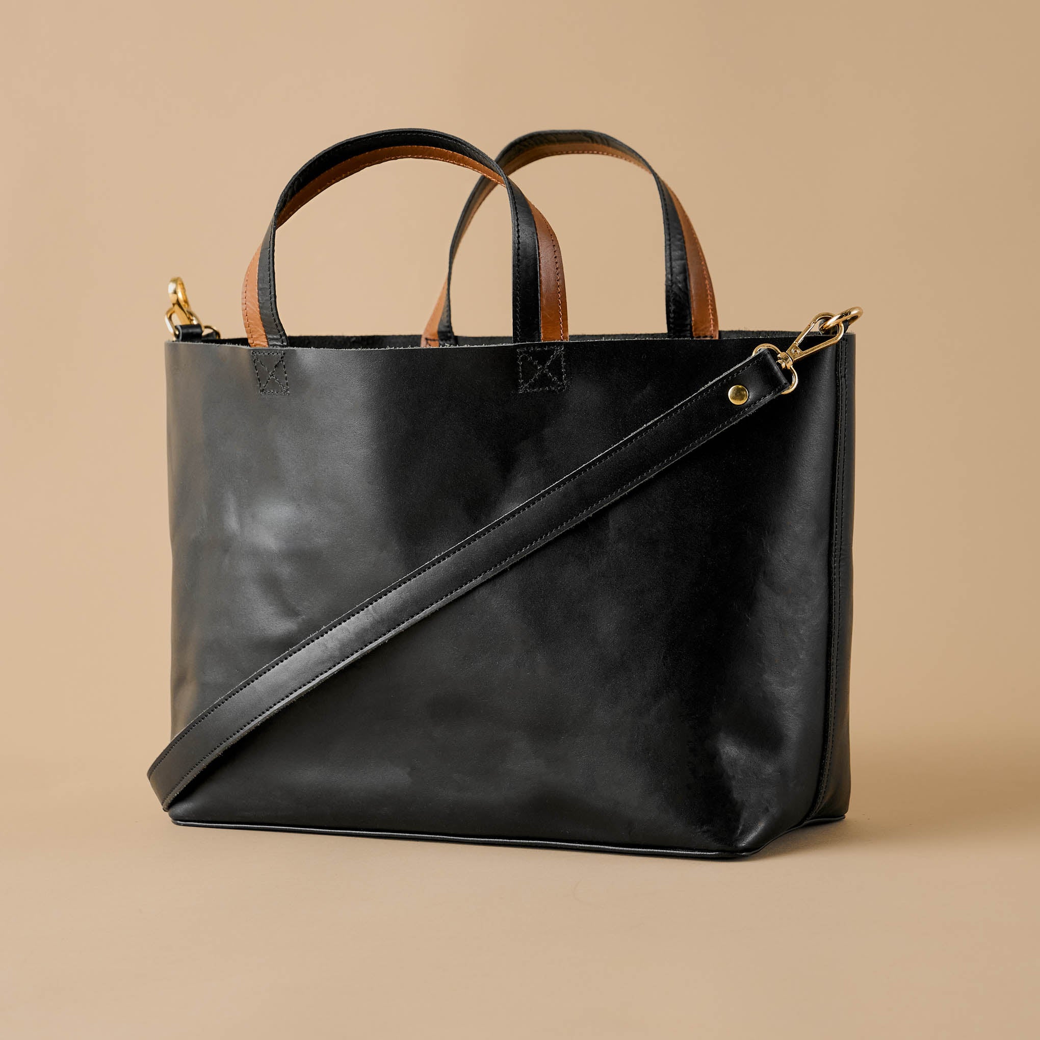 Magnolia Essential Black Crossbody Tote On sale for $123.24, discounted from $238.00