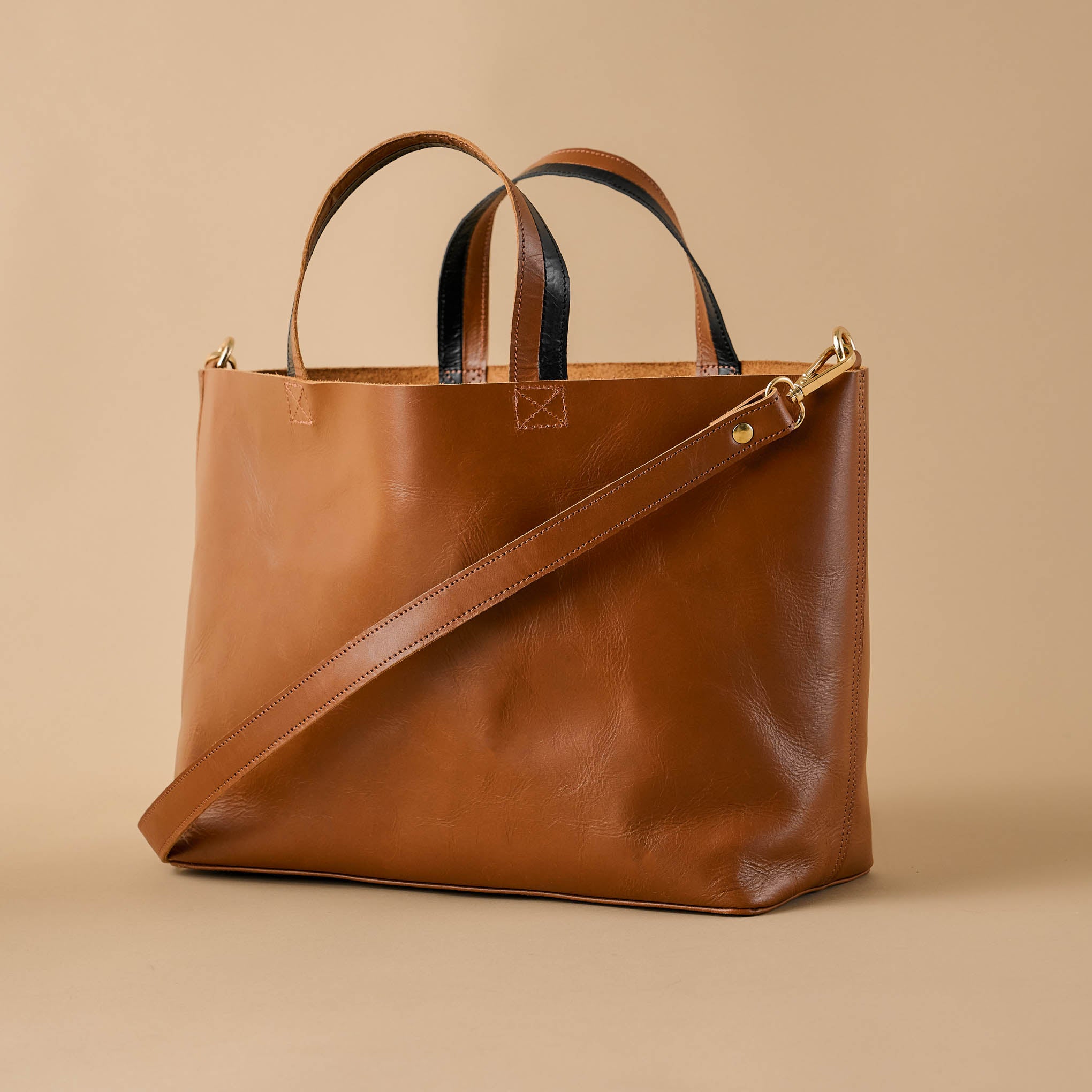 Magnolia Essential Caramel Crossbody Tote On sale for $123.24, discounted from $238.00