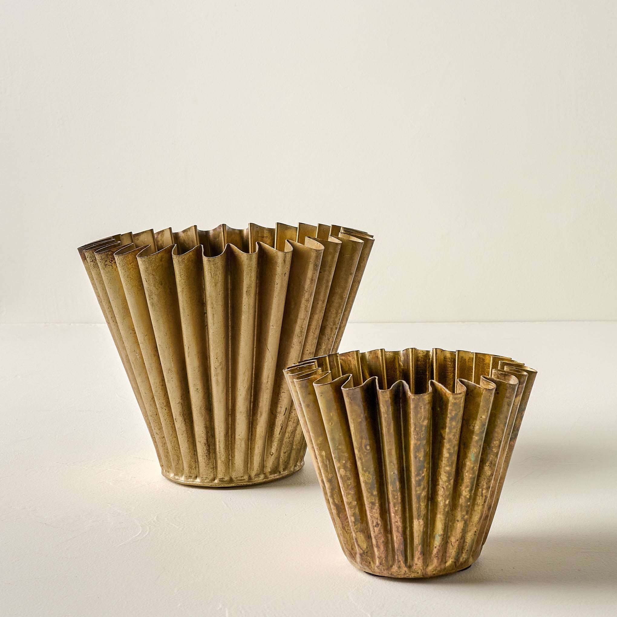 Antique Brass Fluted Planter in large and small sizes Items range from $20.00 to $46.00