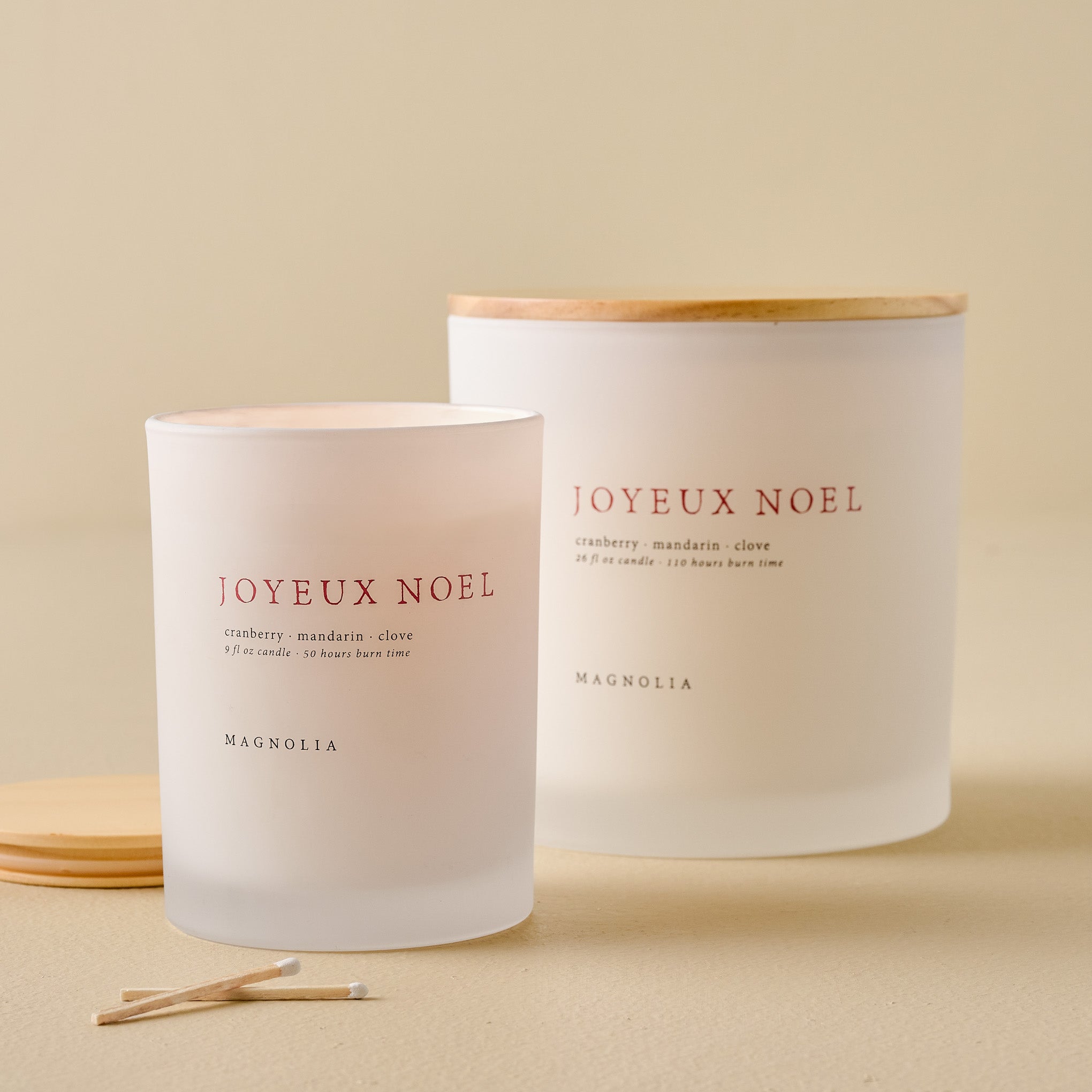 Magnolia Joyeux Noel Candles shown together Items range from $30.00 to $58.00