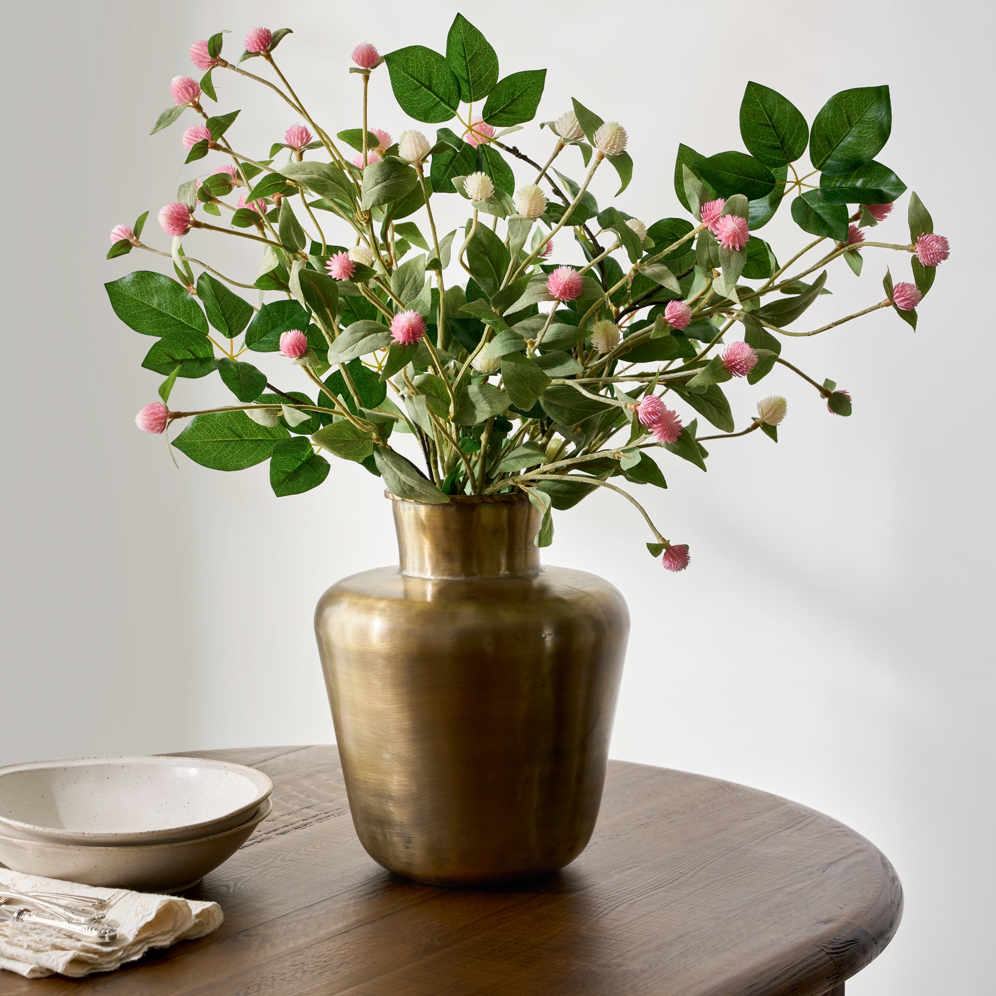 Antiqued Brass Banks Vase shown with seasonal florals $54.00