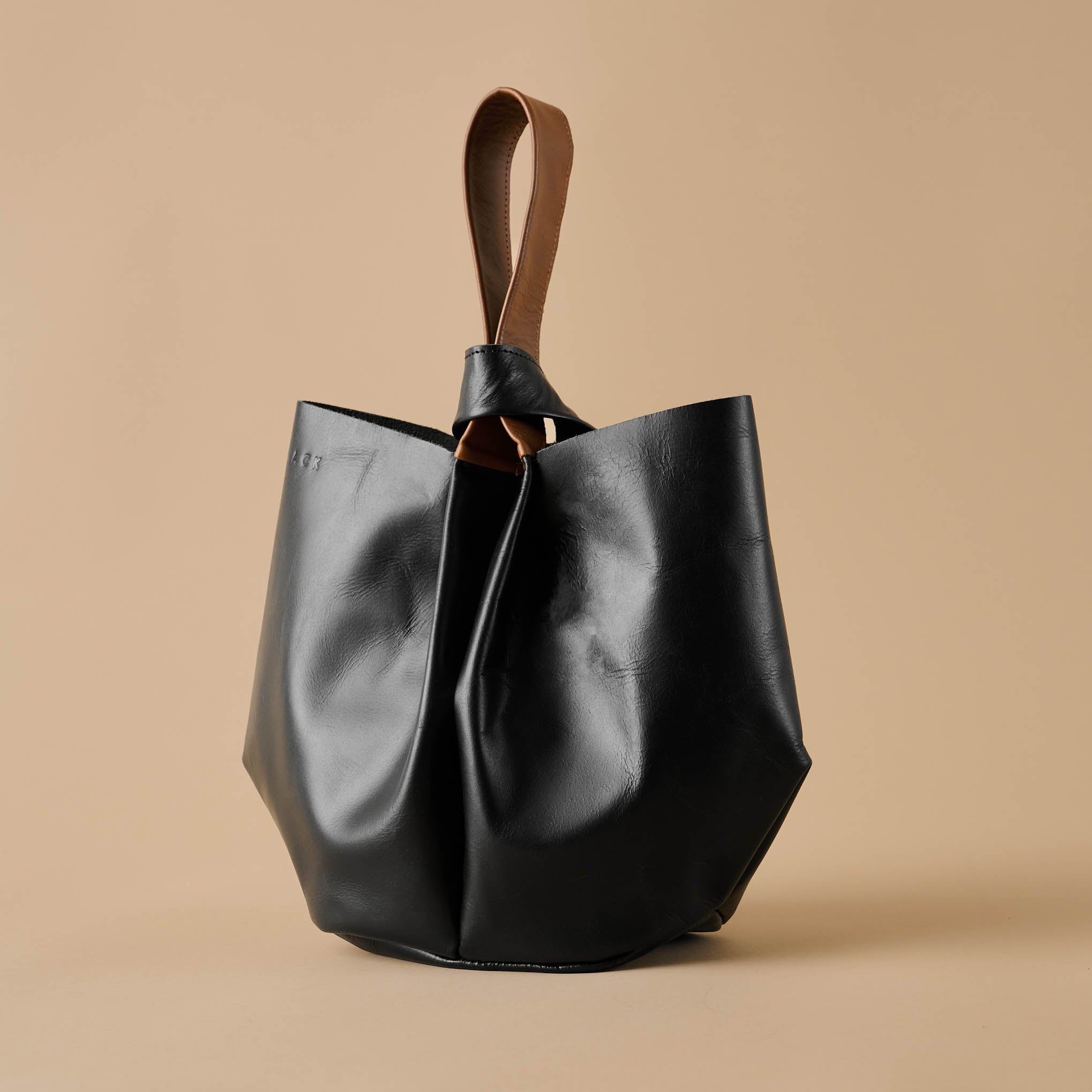 Magnolia Essential Wrist Bag On sale for $114.99, discounted from $195.00