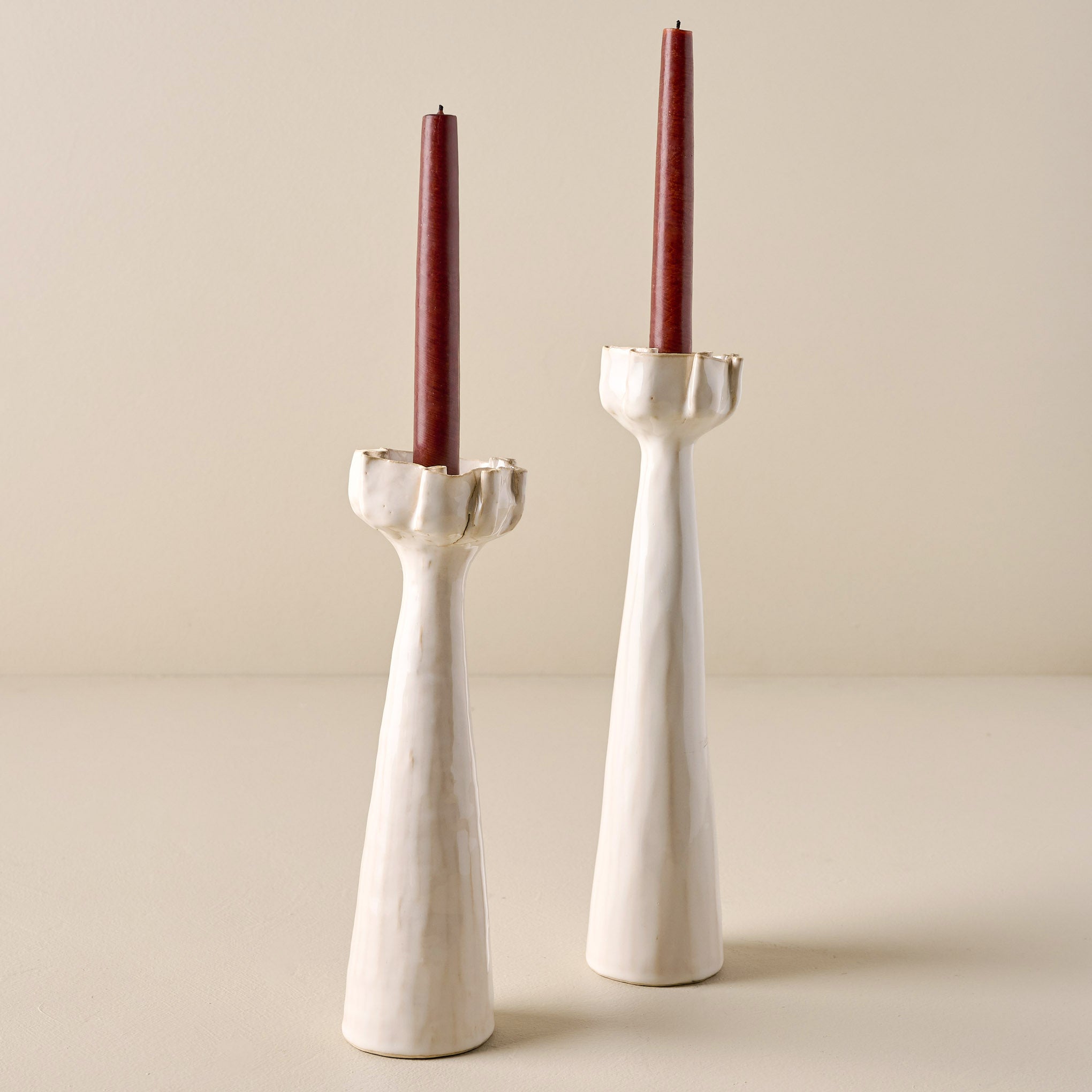 9" and 12" Reese Emry x Magnolia Hand Ruffled Taper Holder shown with red taper candles On sale for $12.74, discounted from $38.00