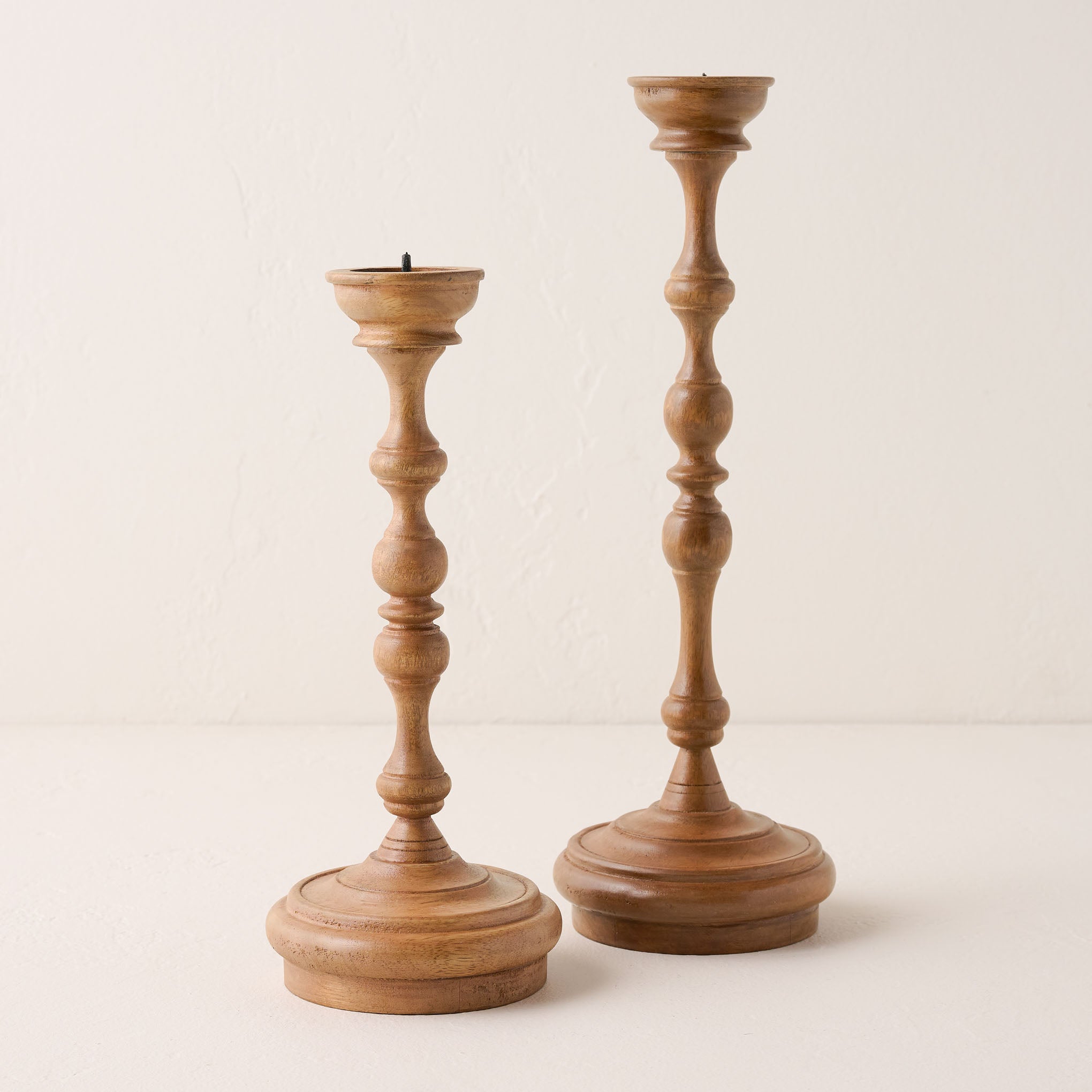 Turned Wood Taper Holder in short and tall On sale for $14.99, discounted from $36.00