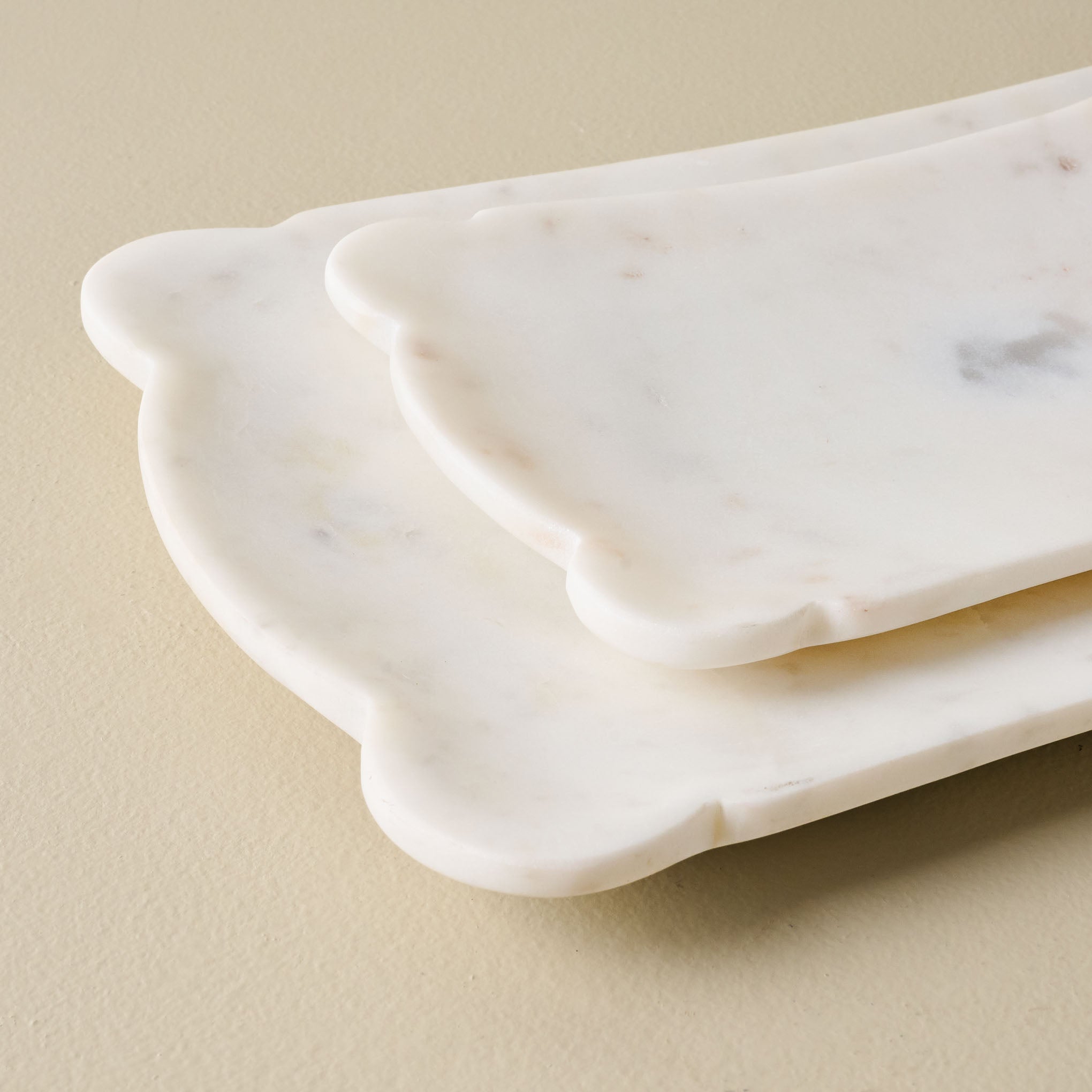 Scalloped Edge Marble Tray - Set of 2 stacked shown up close