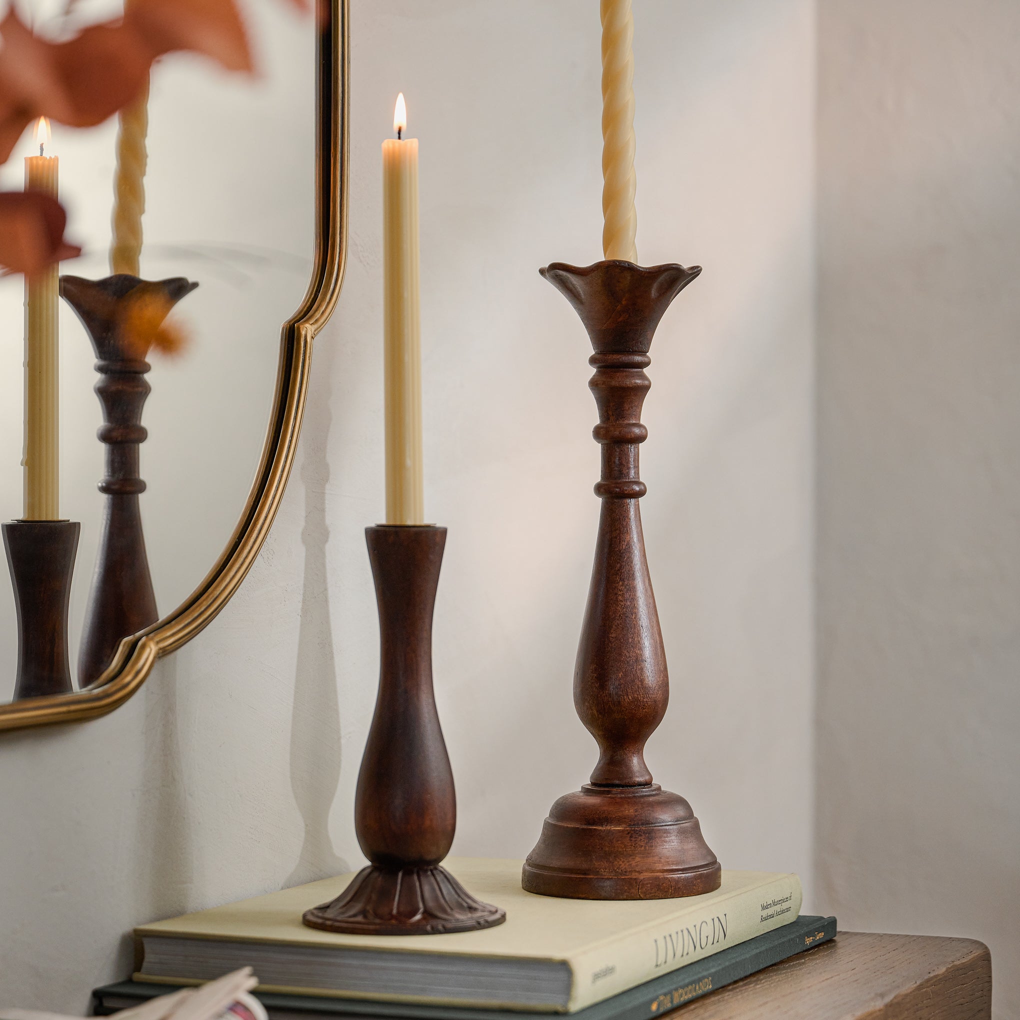 Short and Tall Flora Wood Taper Holders shown with candles Items range from $22.00 to $32.00