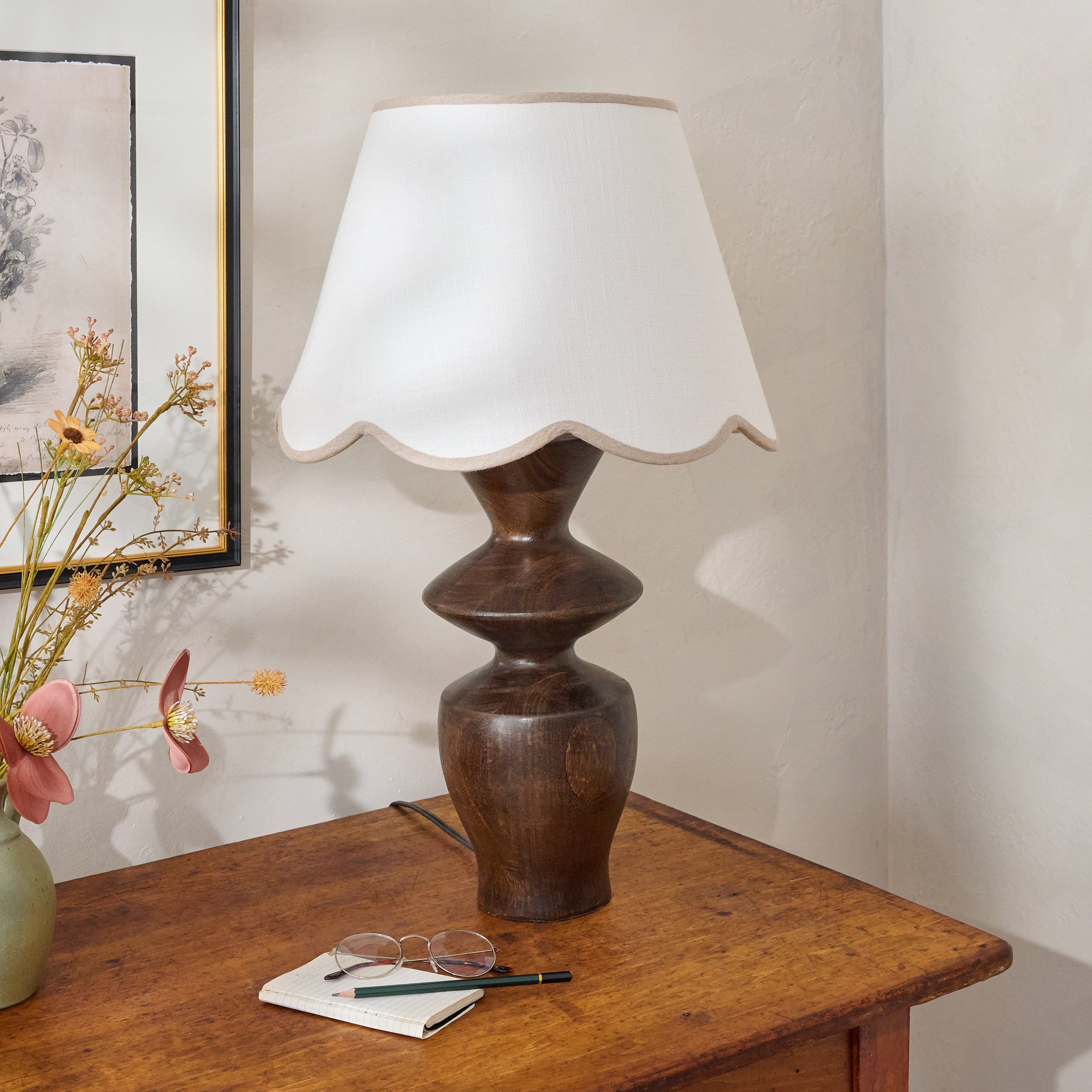 Reyna Turned Wood Table Lamp shown sitting on table