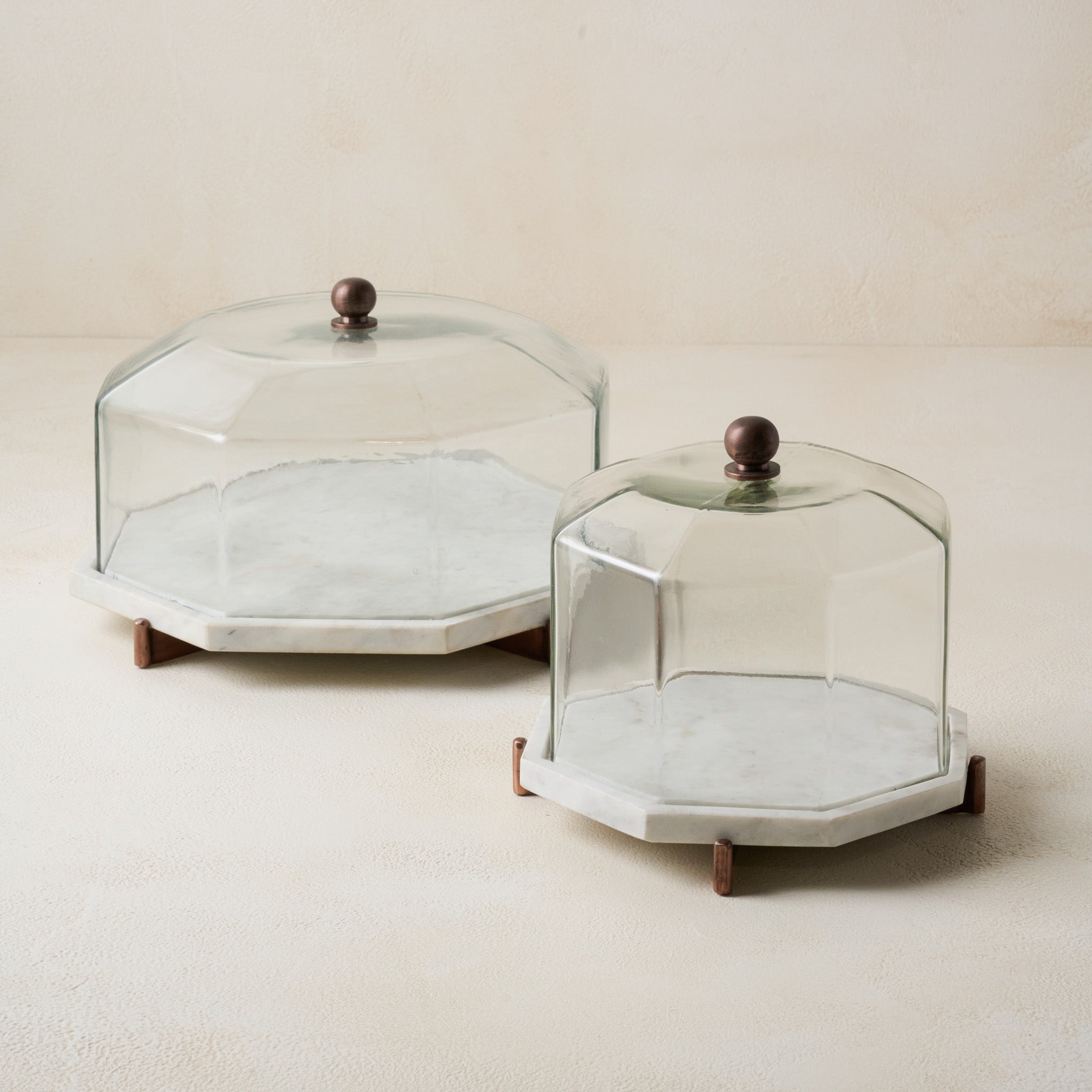 Marble and Copper Cake Stand in large and small sizes Items range from $62.00 to $88.00