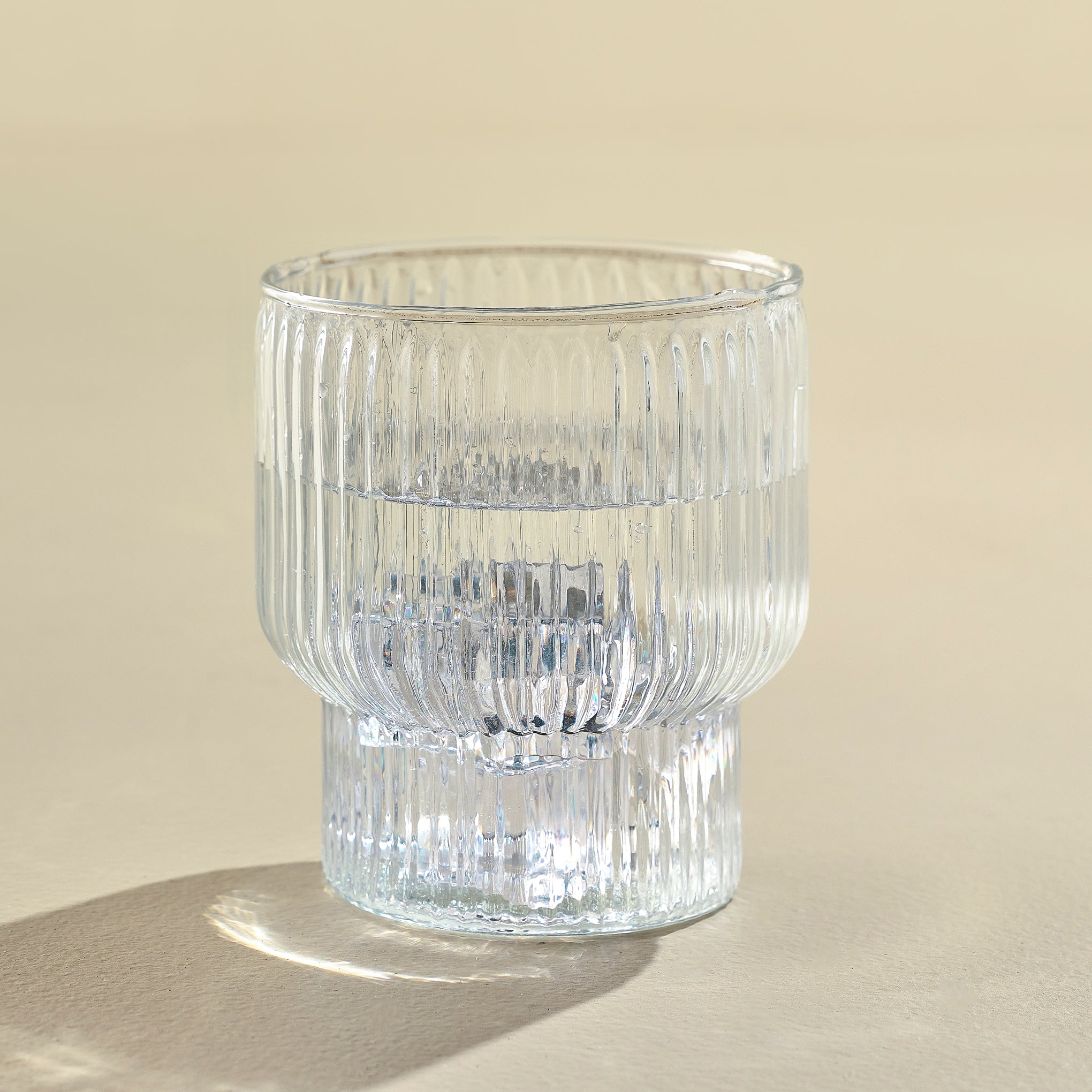 Short Atlas Ribbed Stacking Glass Tumbler shown with water