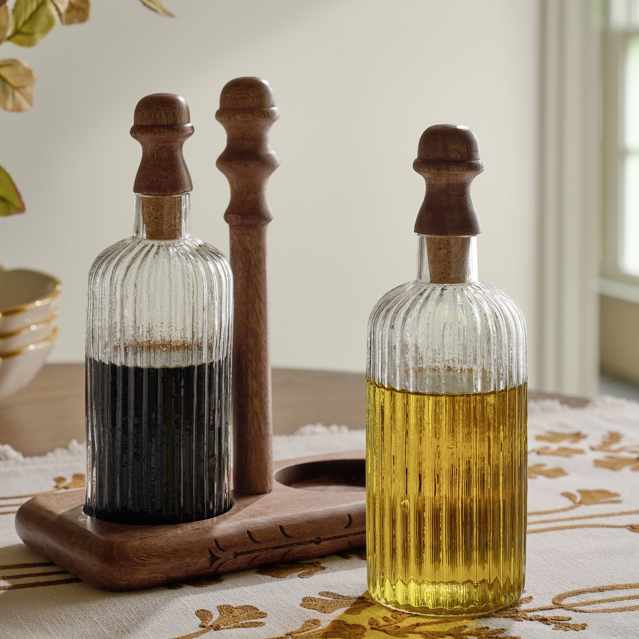 Antiqued Wood Ribbed Glass Oil & Vinegar Set shown up close on table
