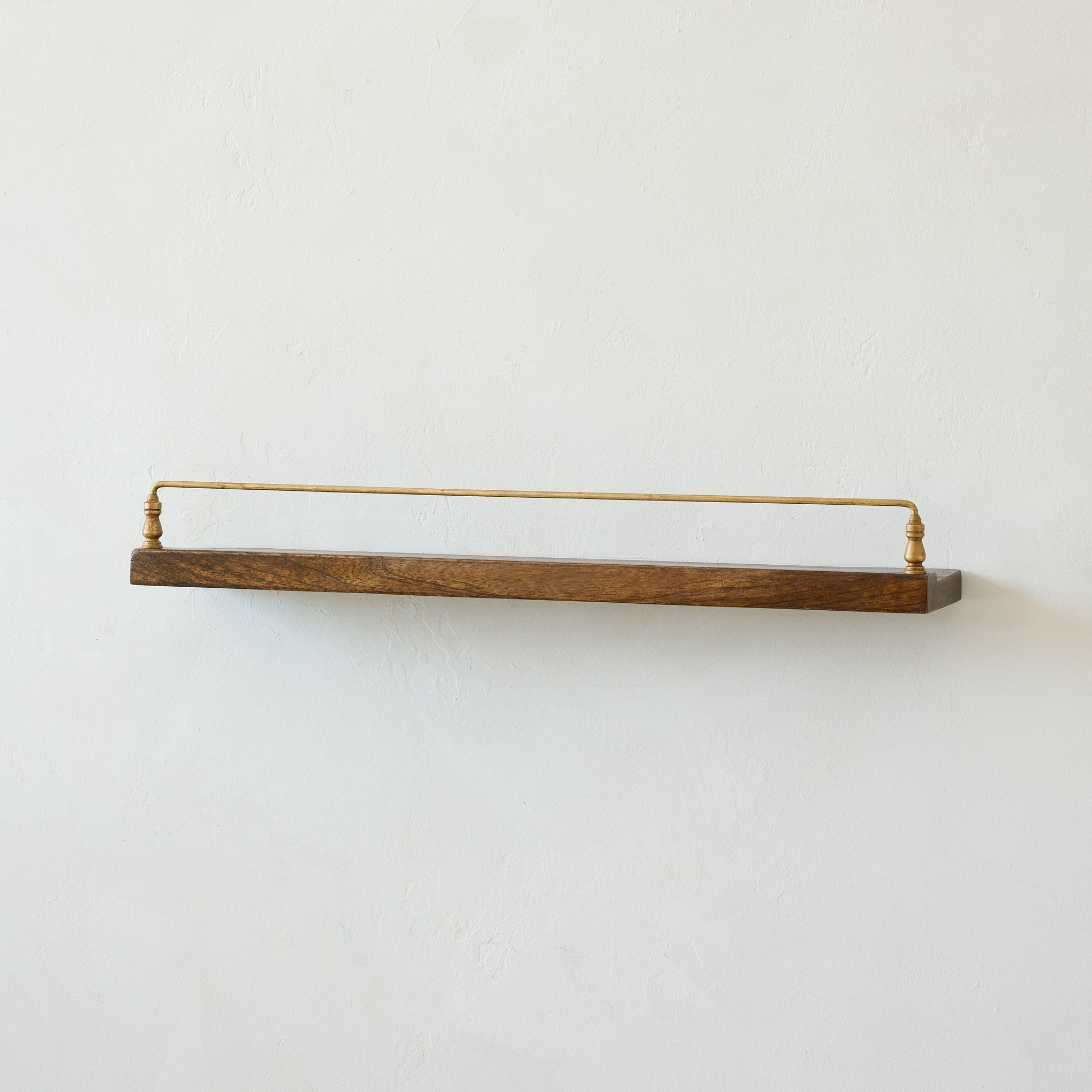 Elliott Wood and Brass Picture Ledge in small size on wall
