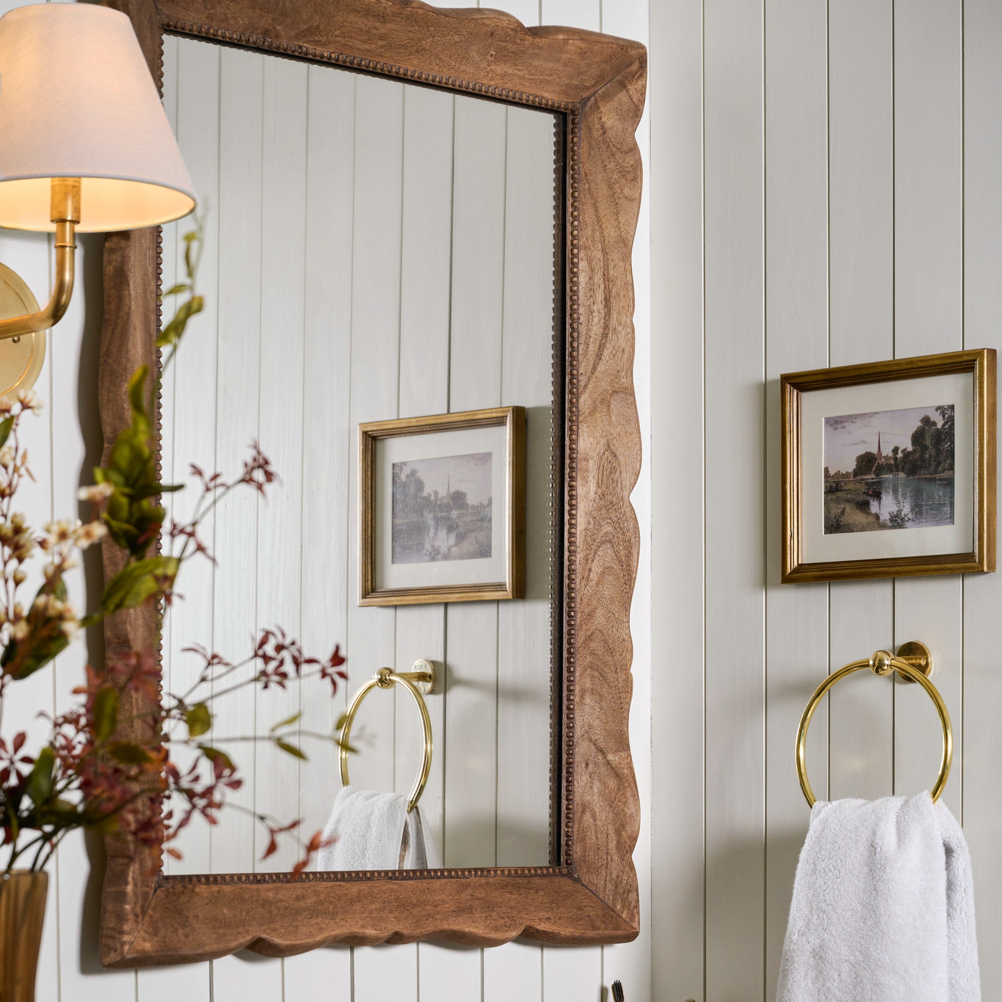 Lucy Vanity Mirror shown hung in bathroom $180.00
