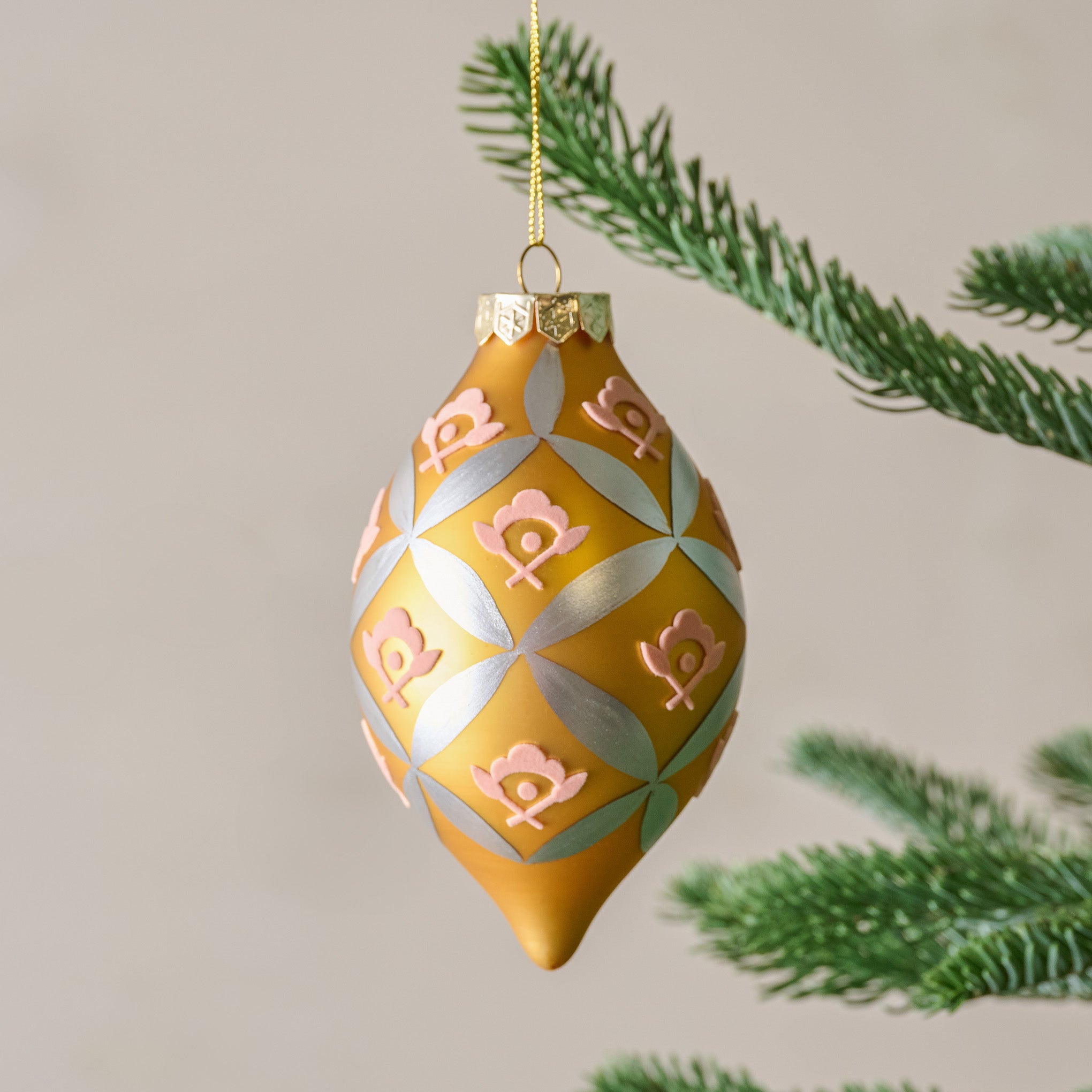 Gold Floral Motif Ornament shown on tree