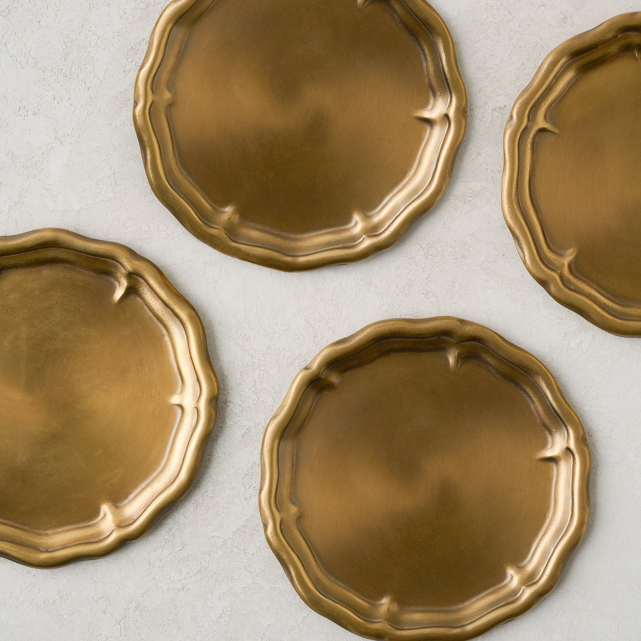 Vintage-Inspired Brass Coaster Set of Four $28.00