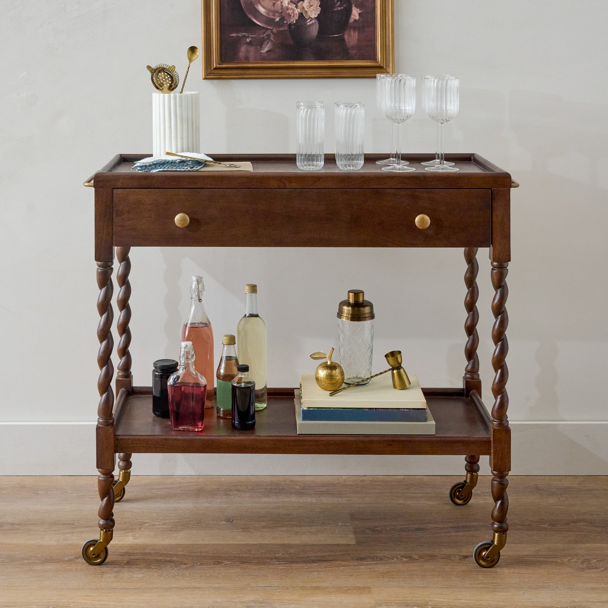 Barley Twist Bar Cart shown styled $549.00