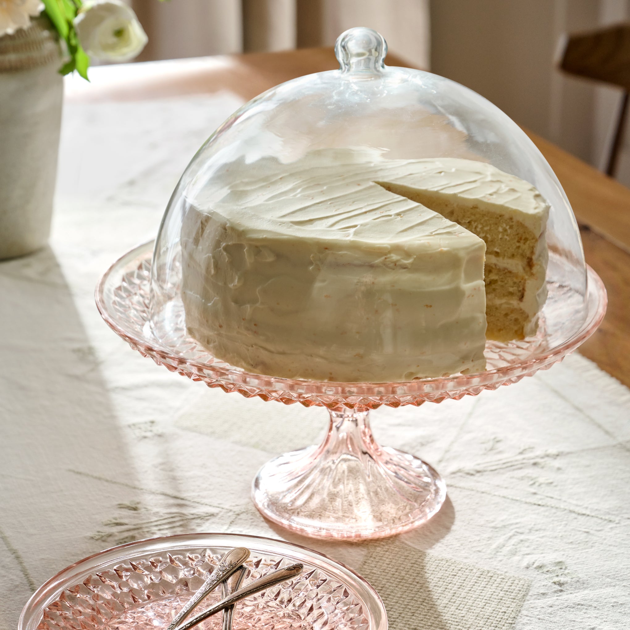 Ellis Vintage-Inspired Cake Stand with Dome on a table with cake $80.00