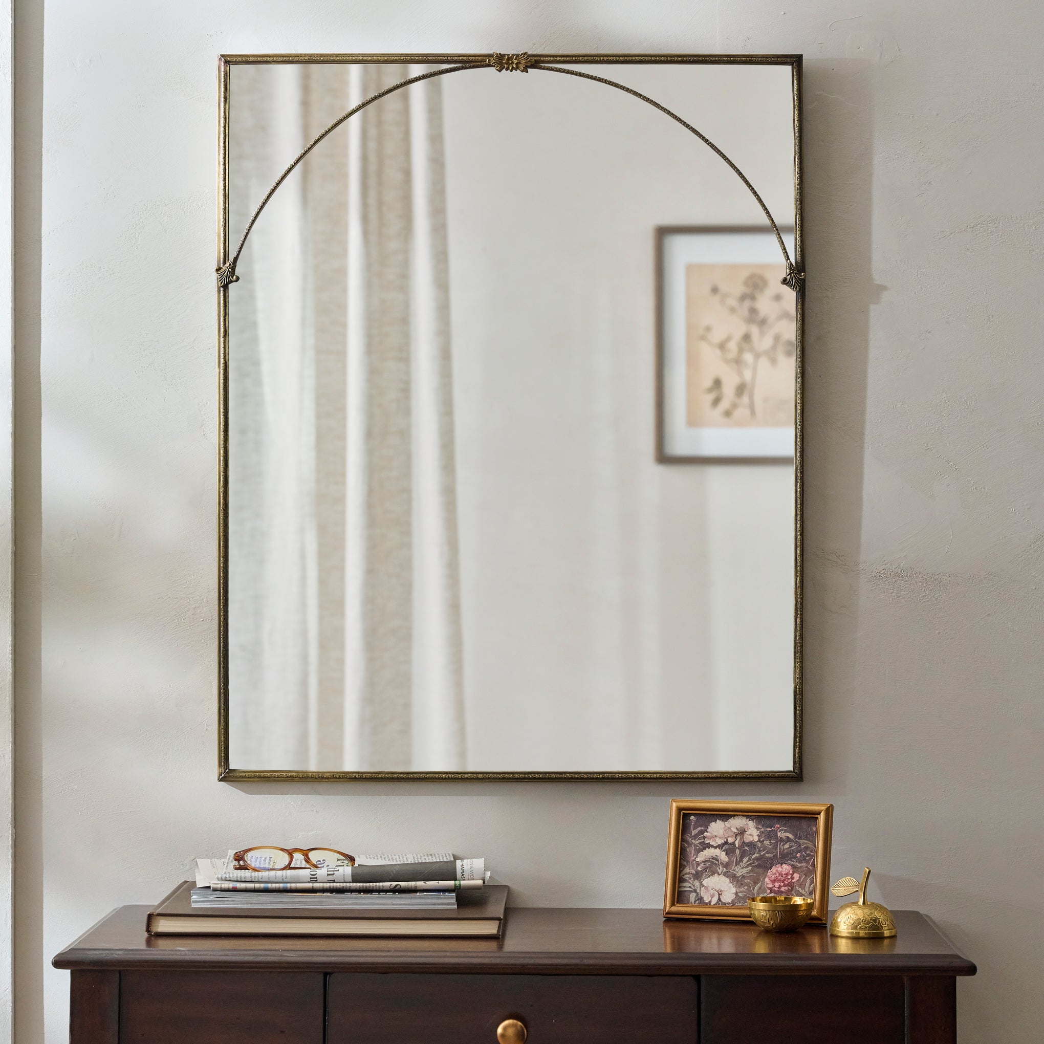 Vienna Metal Framed Mirror shown hung above vanity $228.00