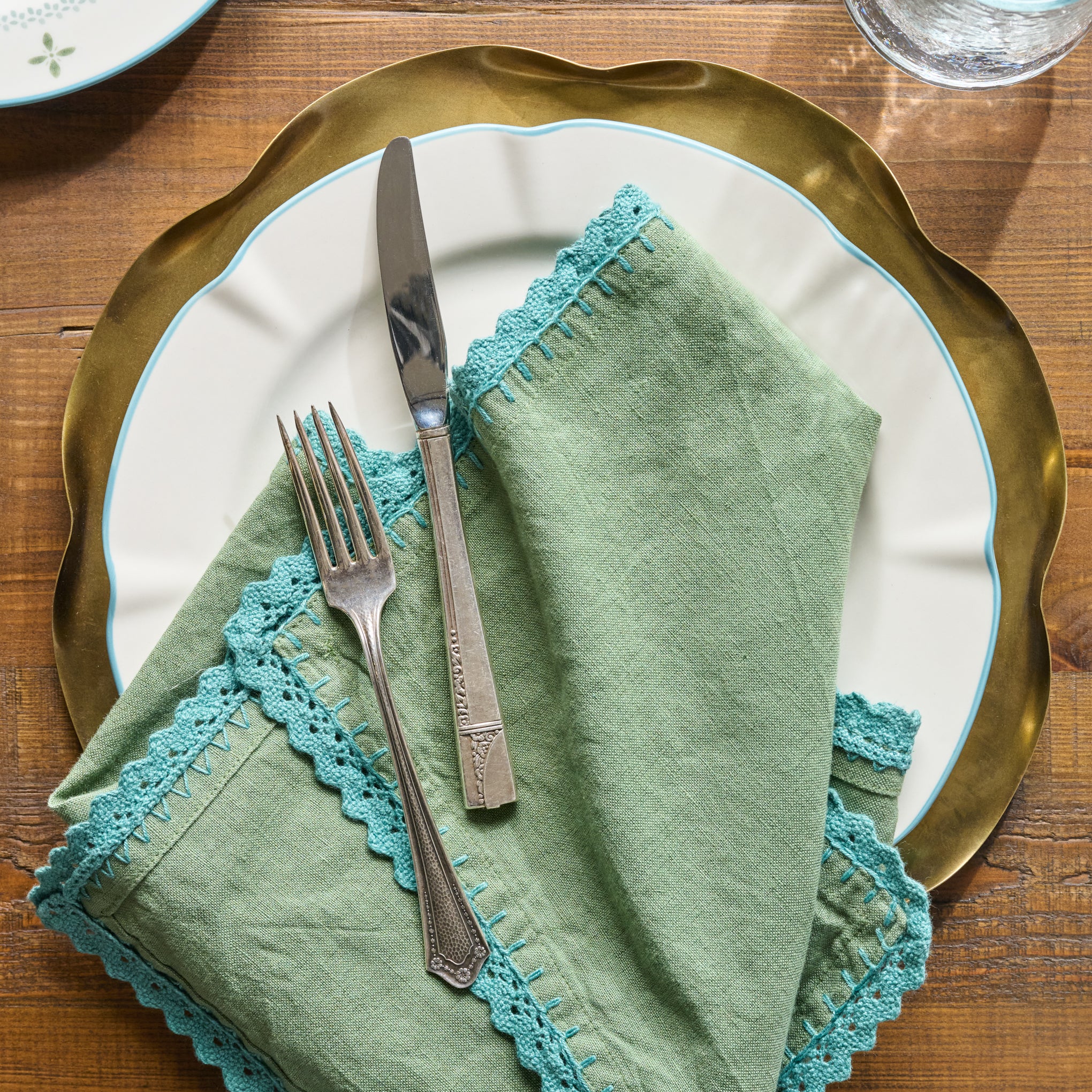 Green Crochet Edge Napkin Set of Four shown with table setting $40.00