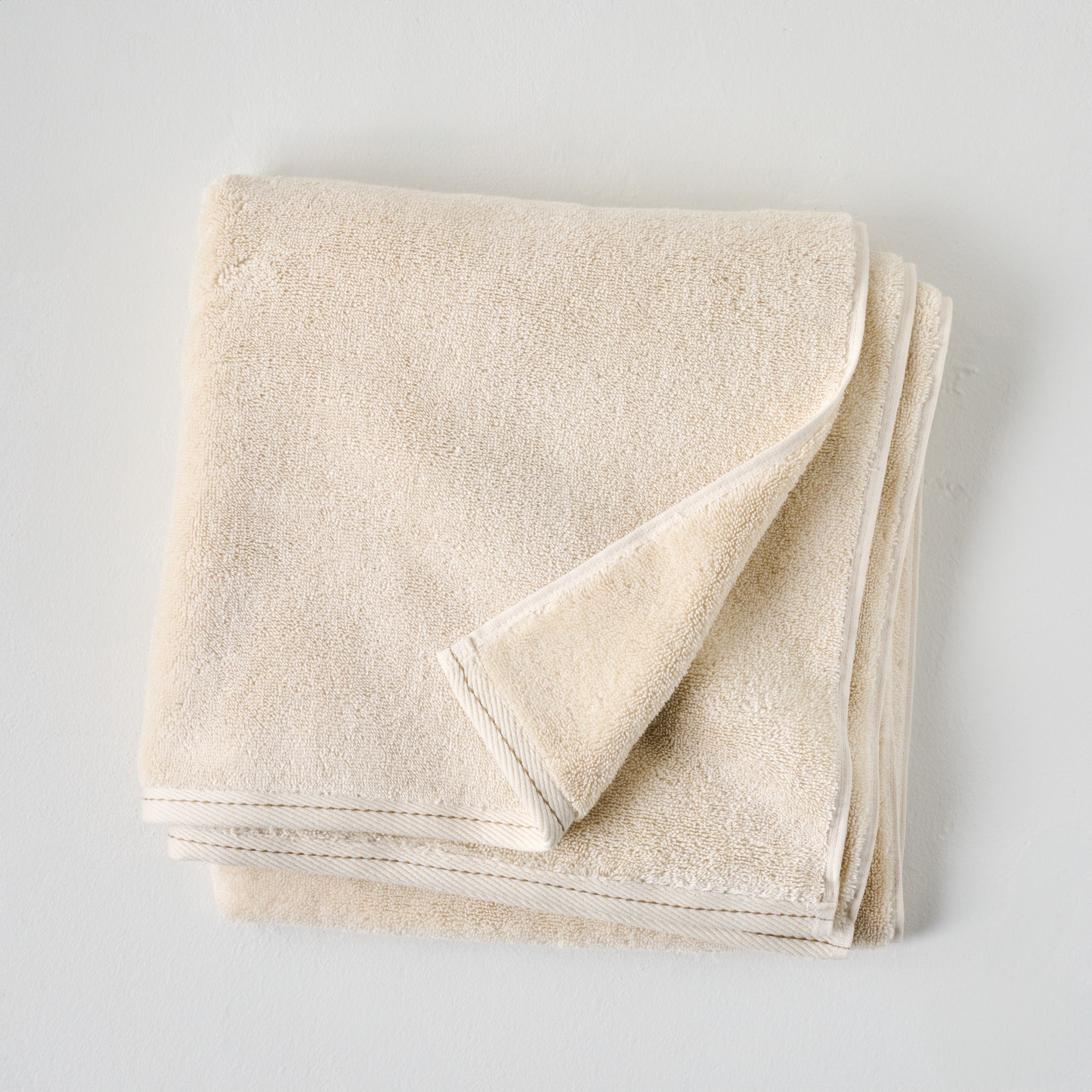 Magnolia Cream Plush Stitched Edge Towel - Bath Towel