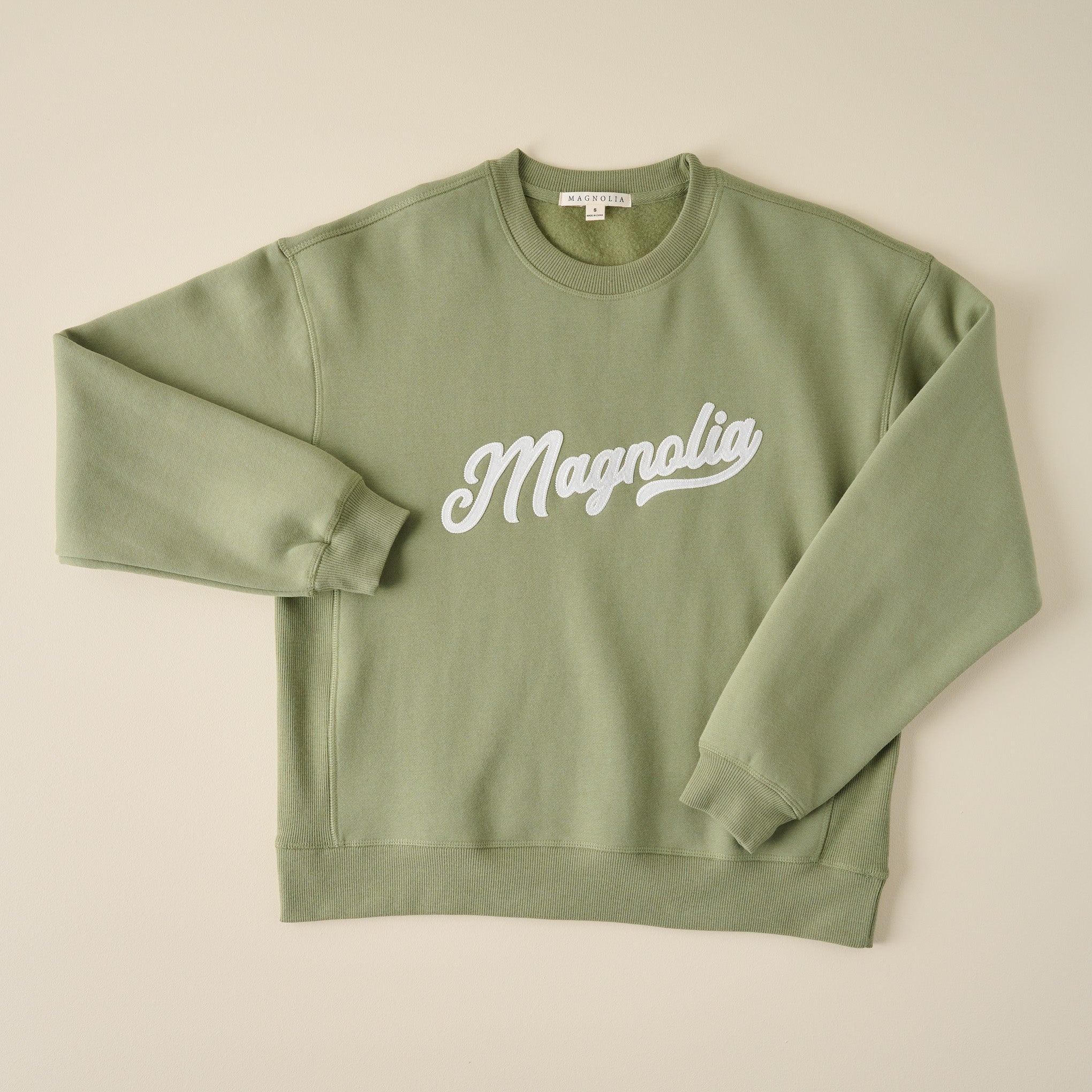 Magnolia Script Green Felt Applique Sweatshirt $64.00