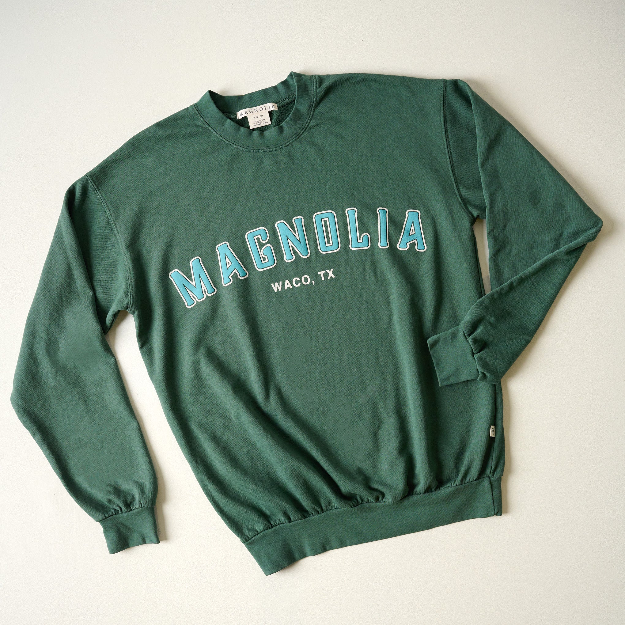 Magnolia Hunter Green Sweatshirt On sale for $44.99, discounted from $64.00