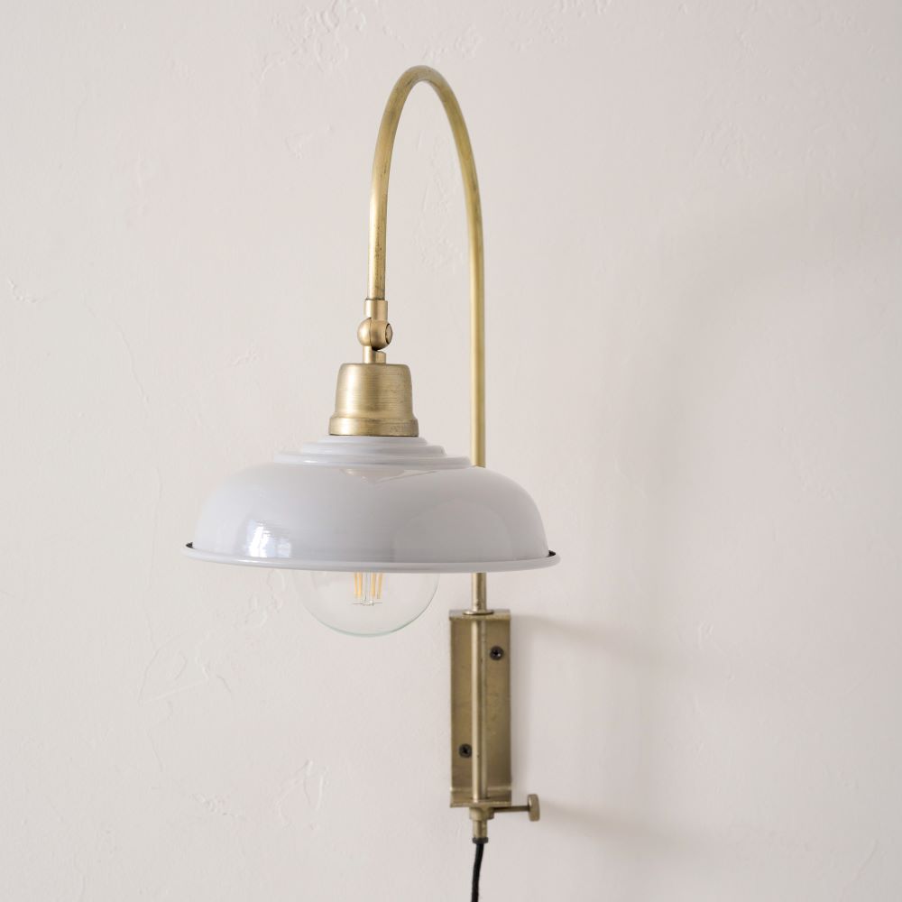 Sybil Ceramic Plug-in Sconce On sale for $70.40, discounted from $88.00