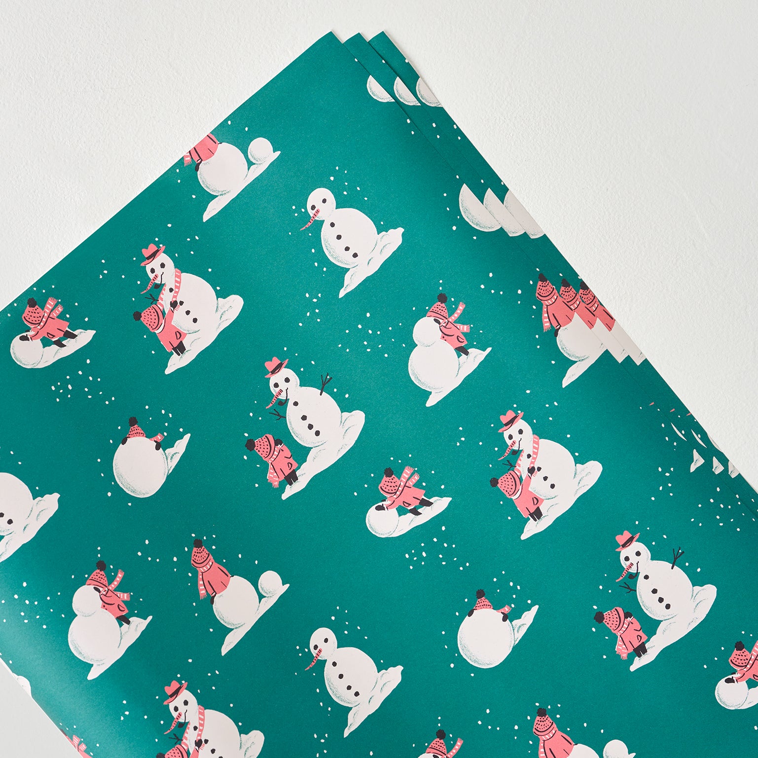 Building Snowman Wrapping Paper Sheets On sale for $6.99, discounted from $10.00