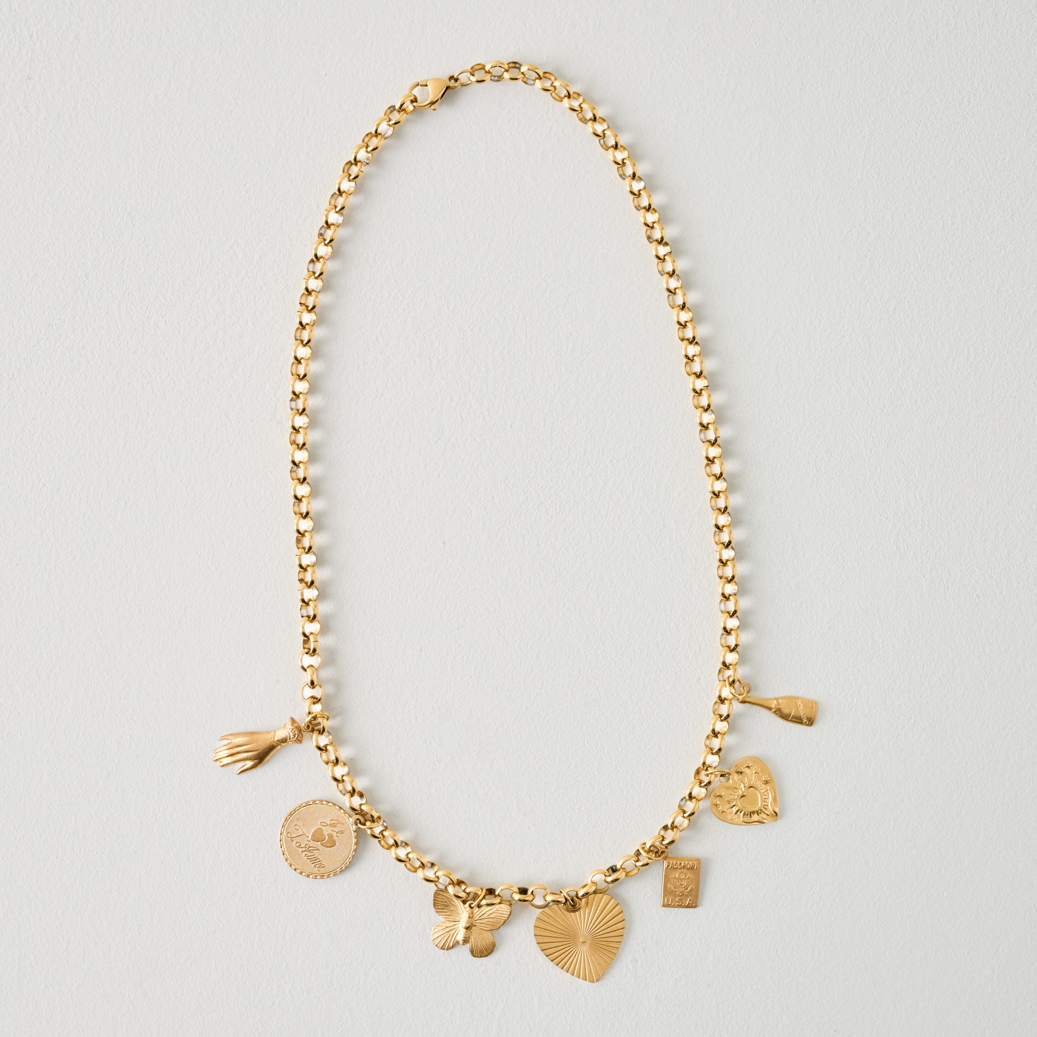 Stationary Brass Charm Necklace $78.00