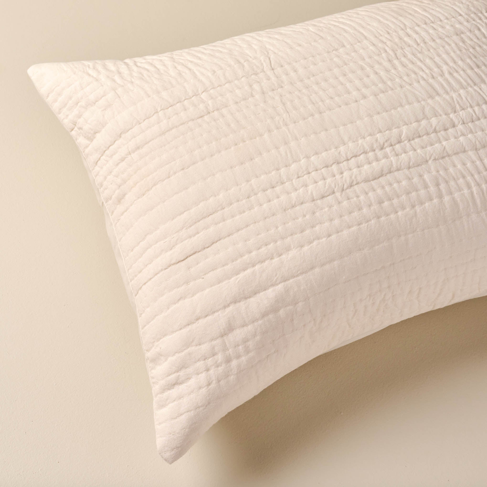 top view of Stonewashed White Grey Pebbled Pillow Sham On sale with items ranging from $34.99 to $39.99, discounted from $49.00 to $59.00