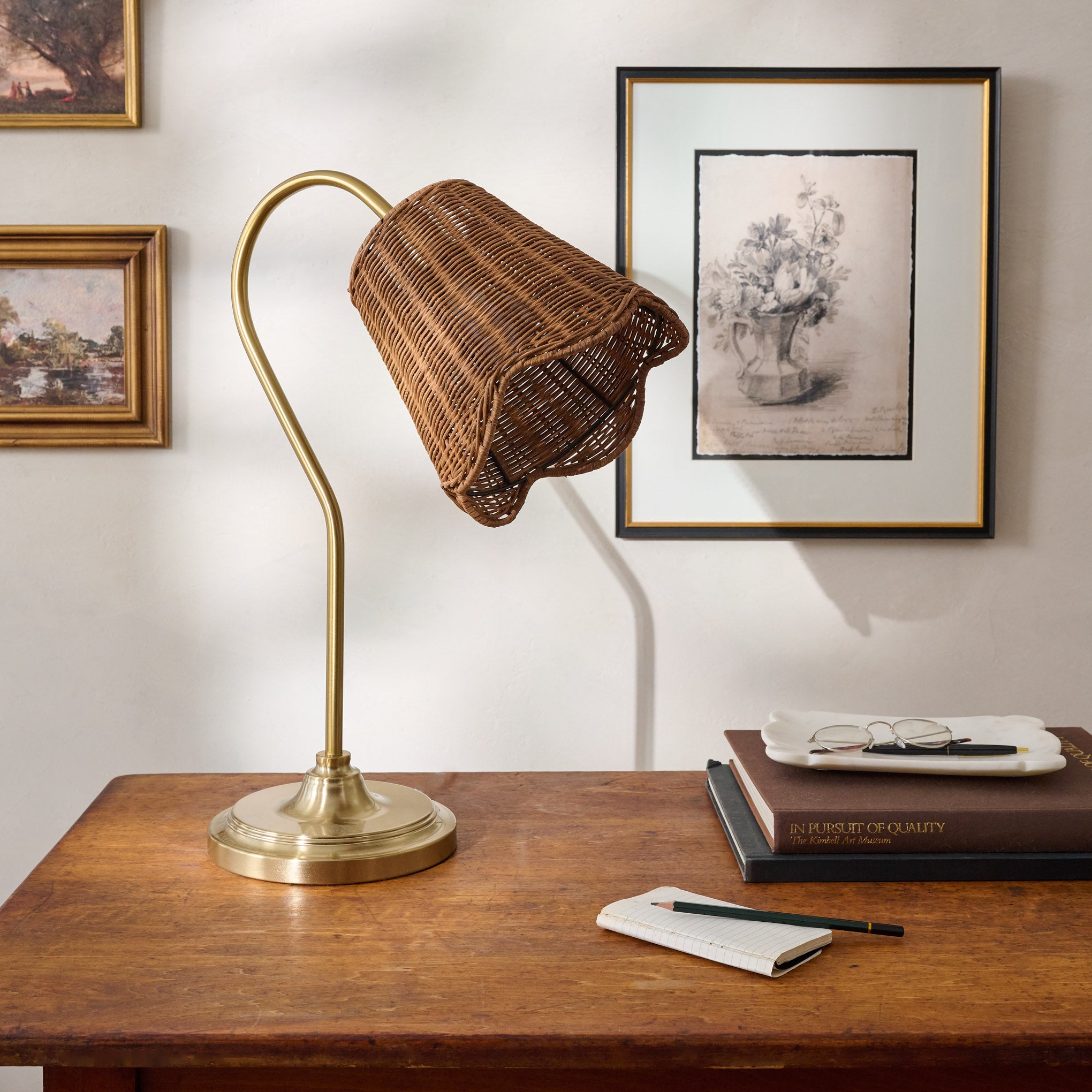 Lucinda Task Lamp with Woven Shade shown sitting on desk $118.00