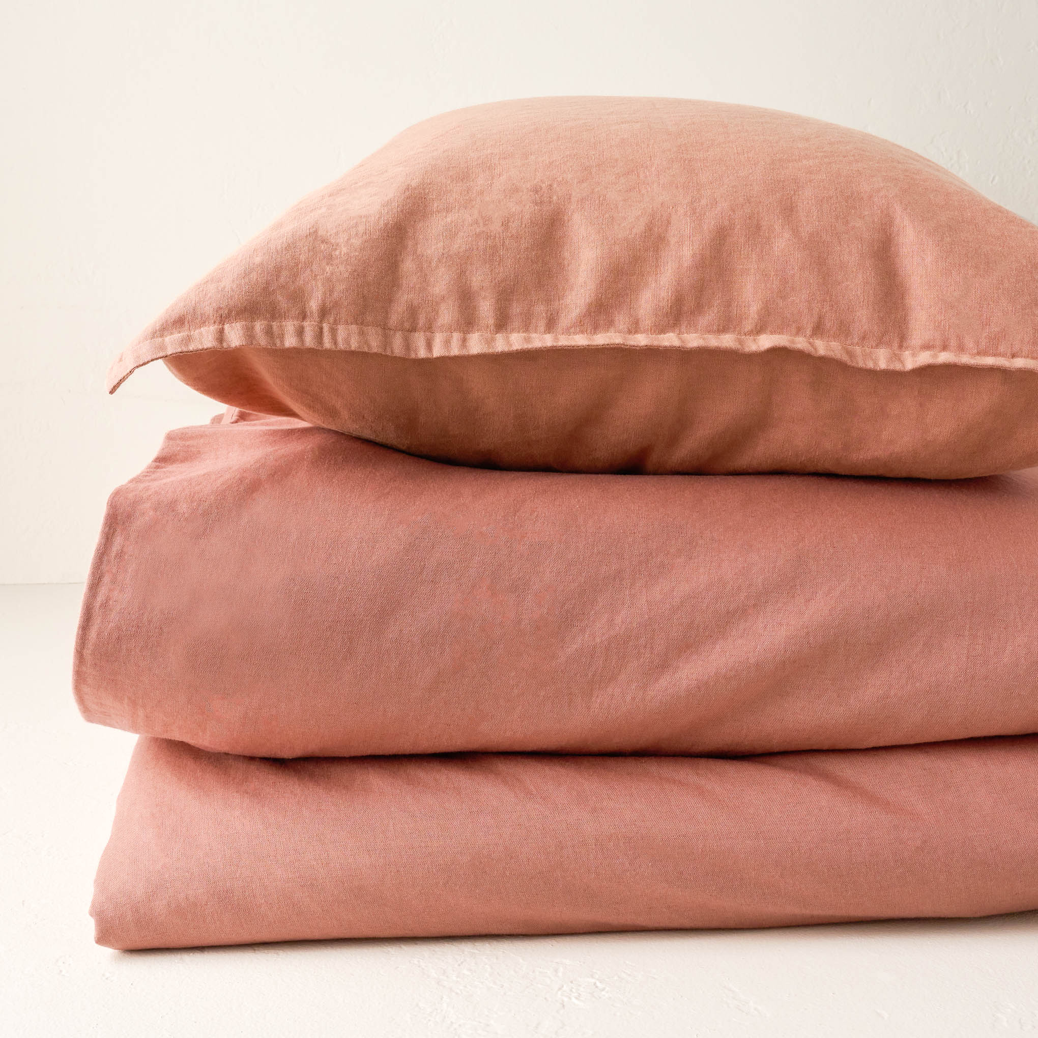 Stacked Desert Clay Washed Linen Cotton Duvet Cover and Pillow Sham On sale with items ranging from $93.49 to $101.99, discounted from $159.00 to $169.00