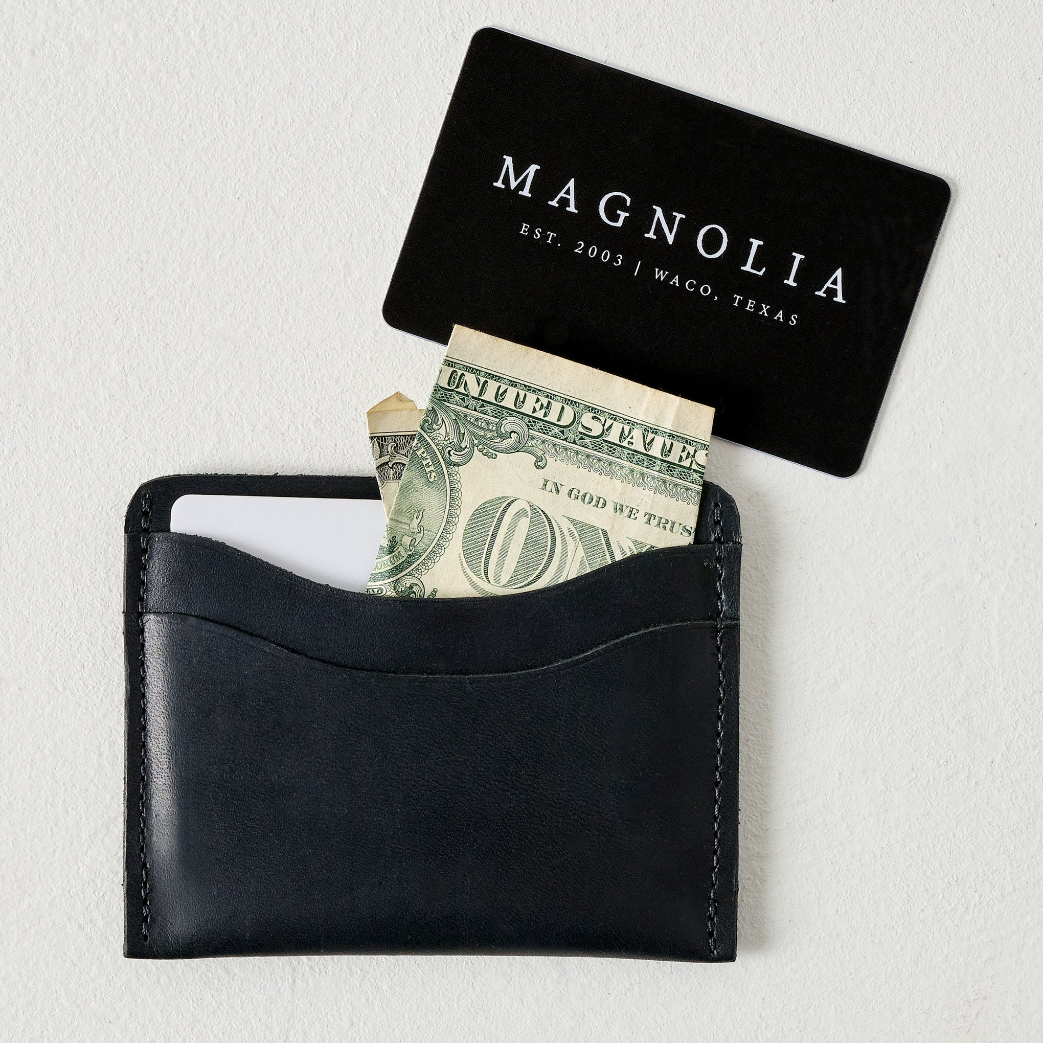 Black Card Wallet shown with money and cards