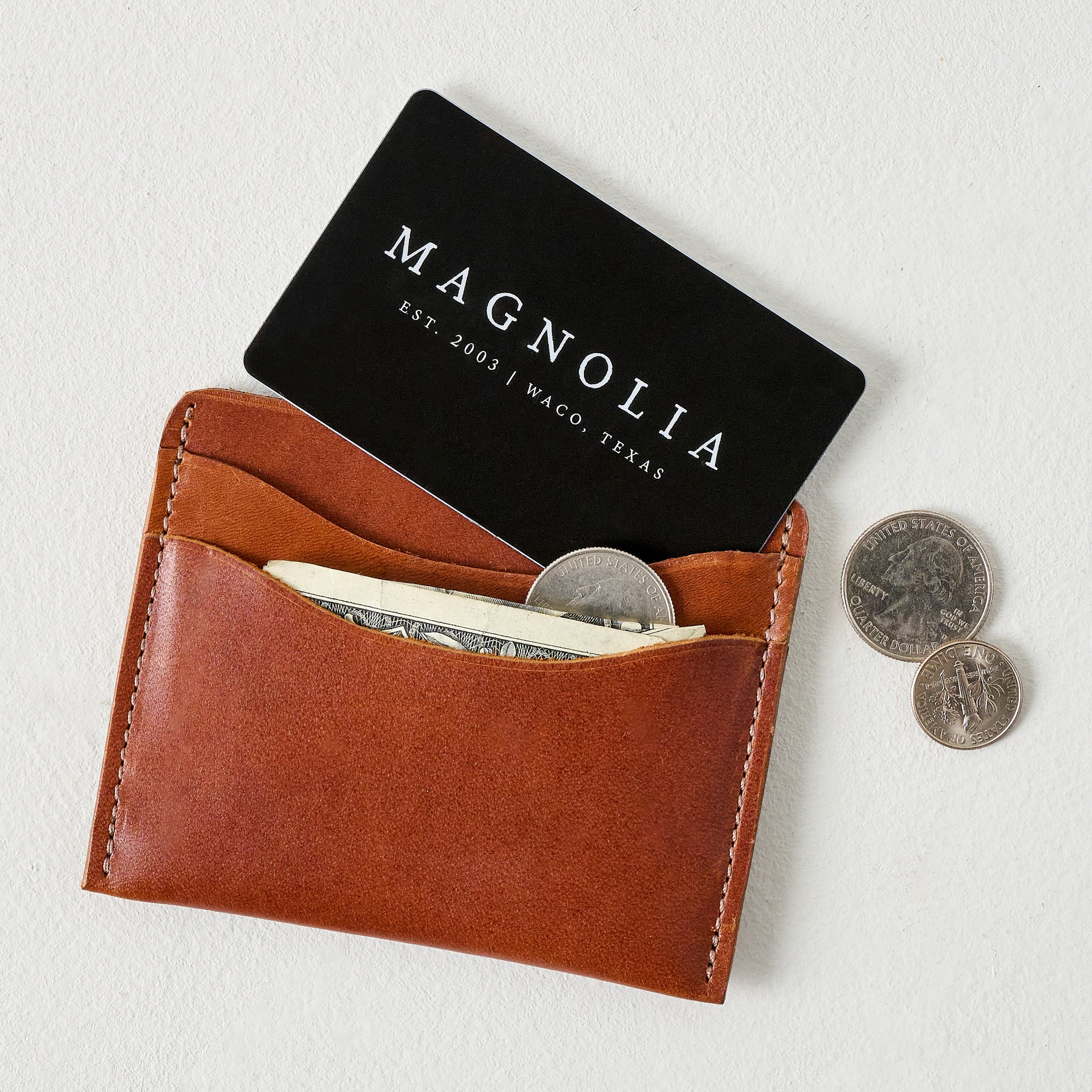 Brown Card Wallet shown with money and card