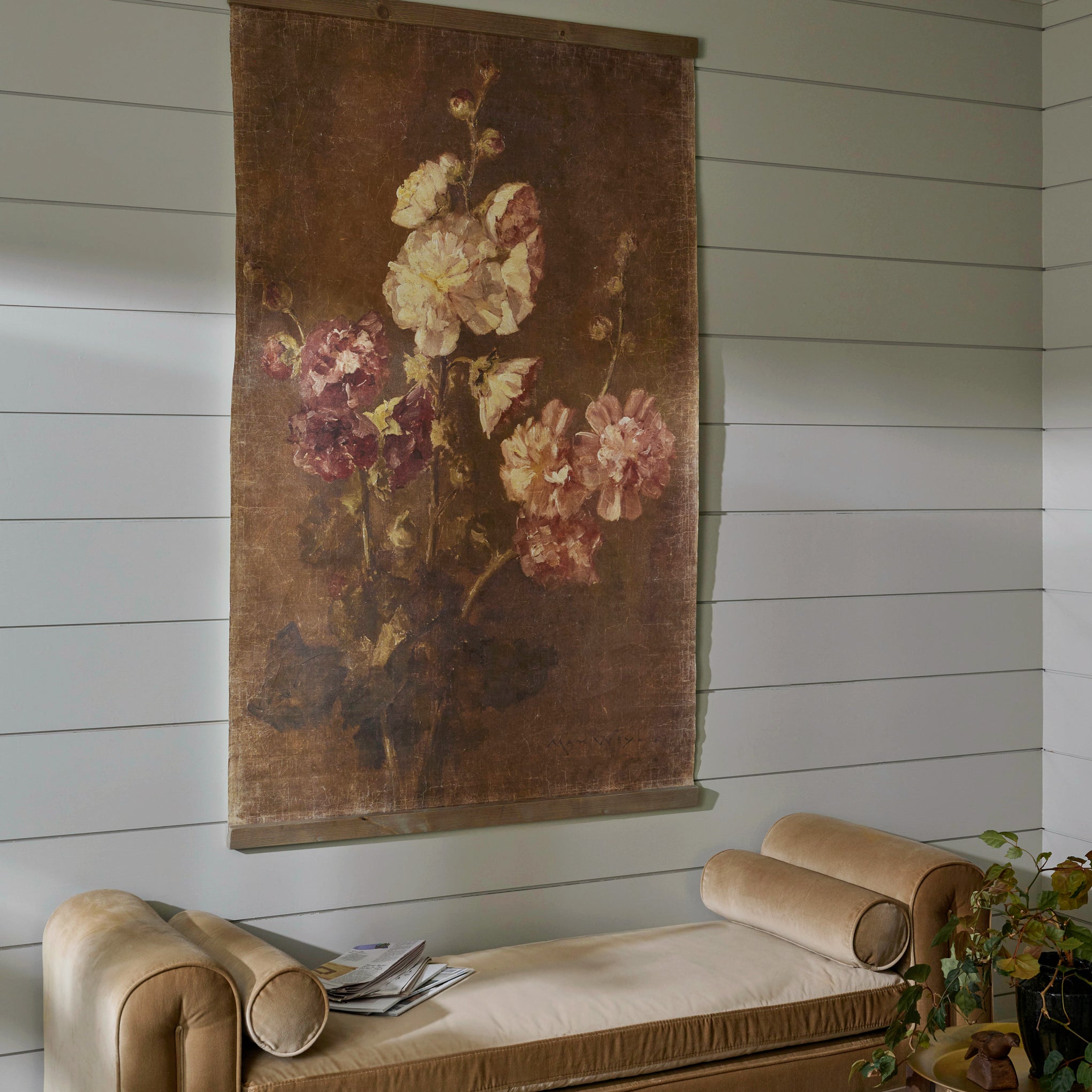 Floral Trio Vintage Tapestry shown hung above couch $98.00