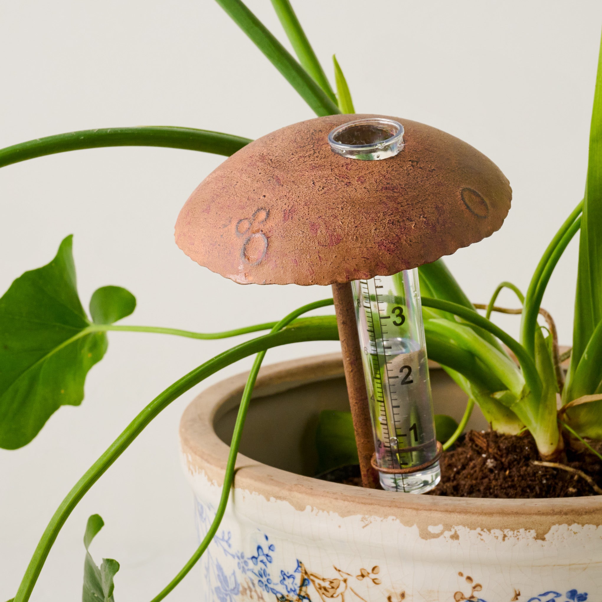 Mushroom Aged Iron Rain Gauge $18.00