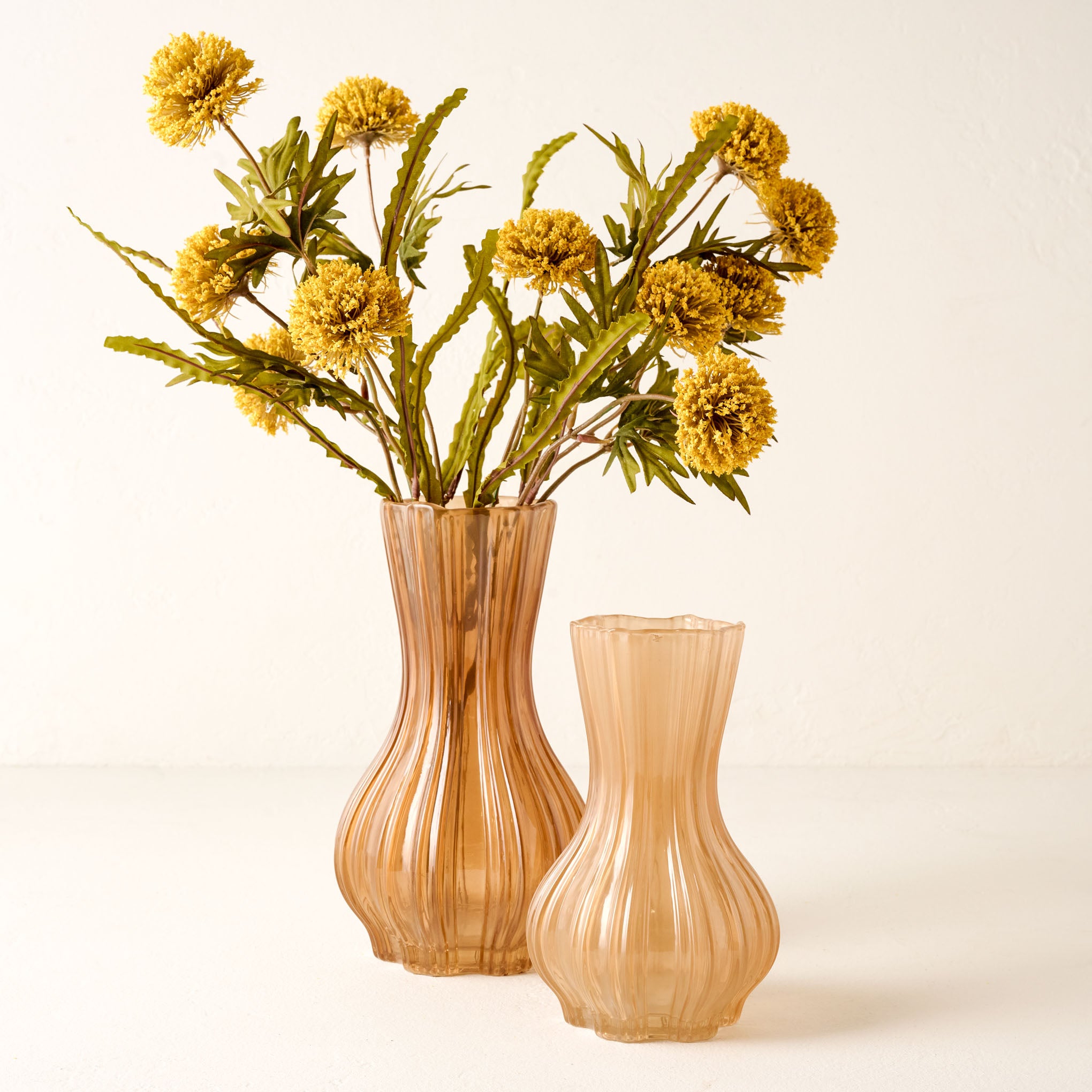 Small and Large Claudia Ribbed Glass Vase with flowers On sale for $19.99, discounted from $42.00
