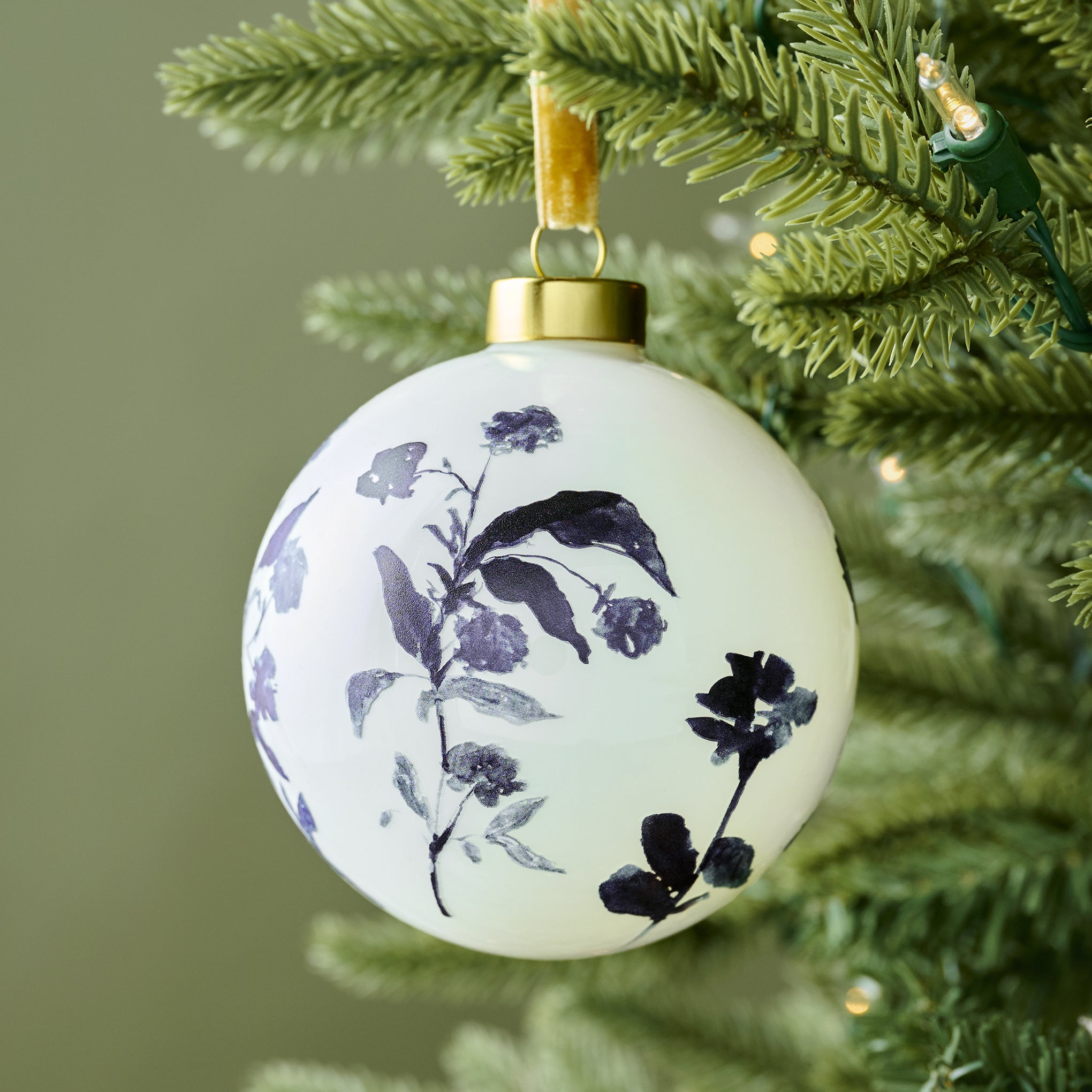 Watercolor Floral Ornament shown on tree