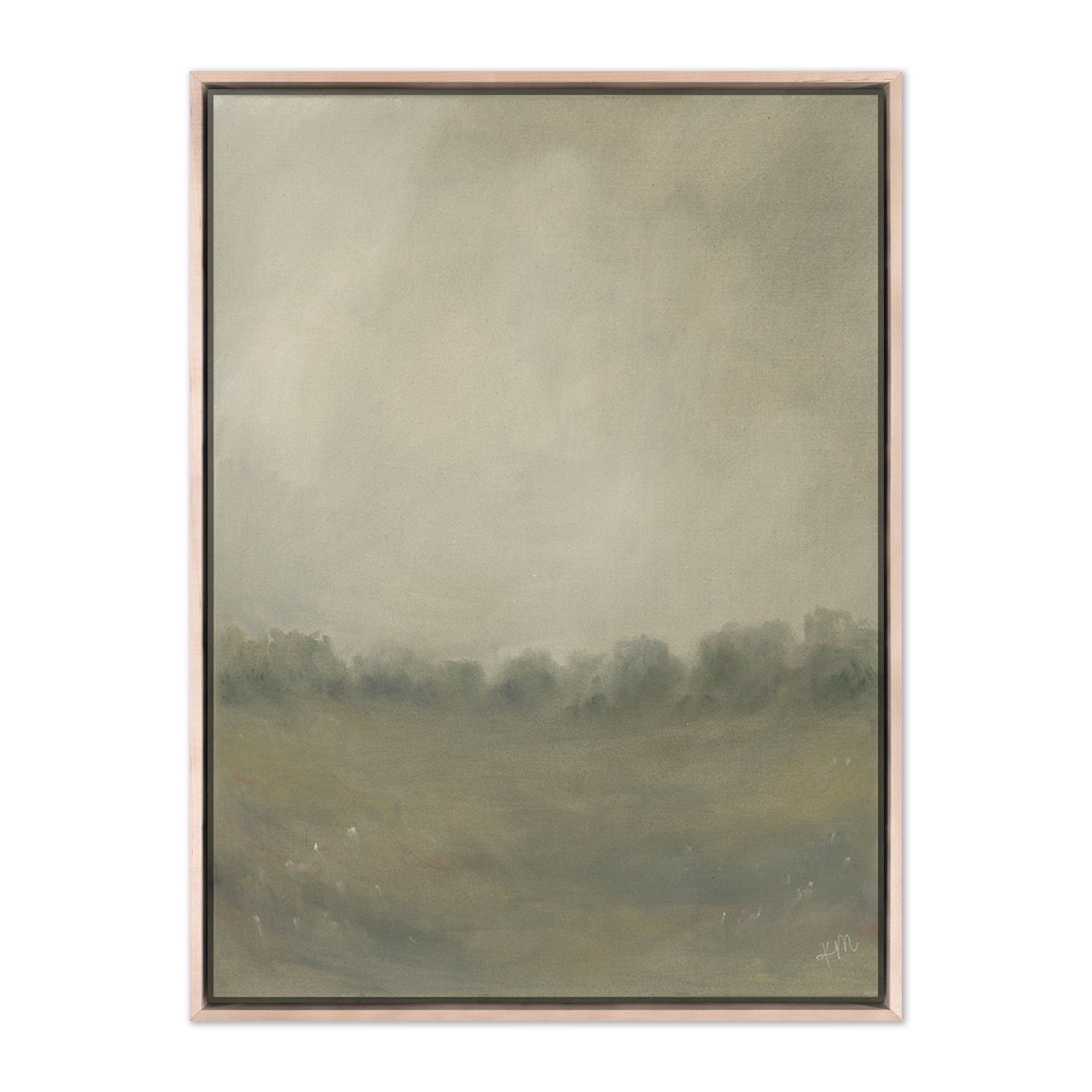 Framed art called The Most Merciful Gift by Katie Mulder shows a muted grassy field and trees under a large grey sky