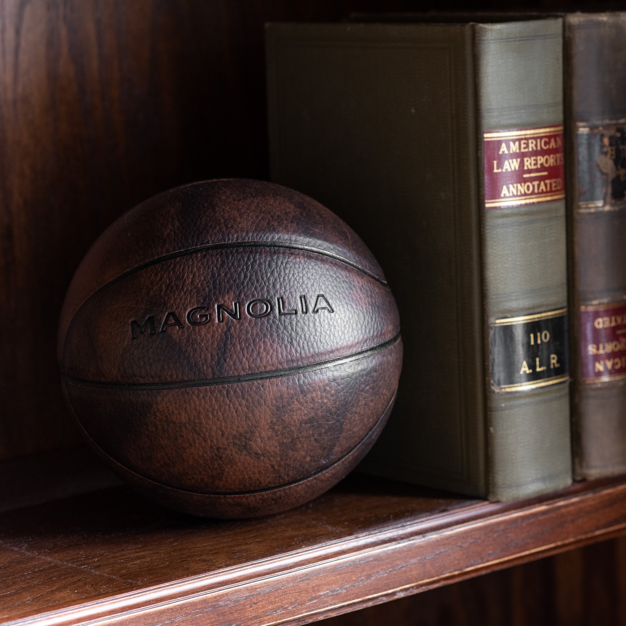 mini leather basketball with magnolia logo embossed $16.00