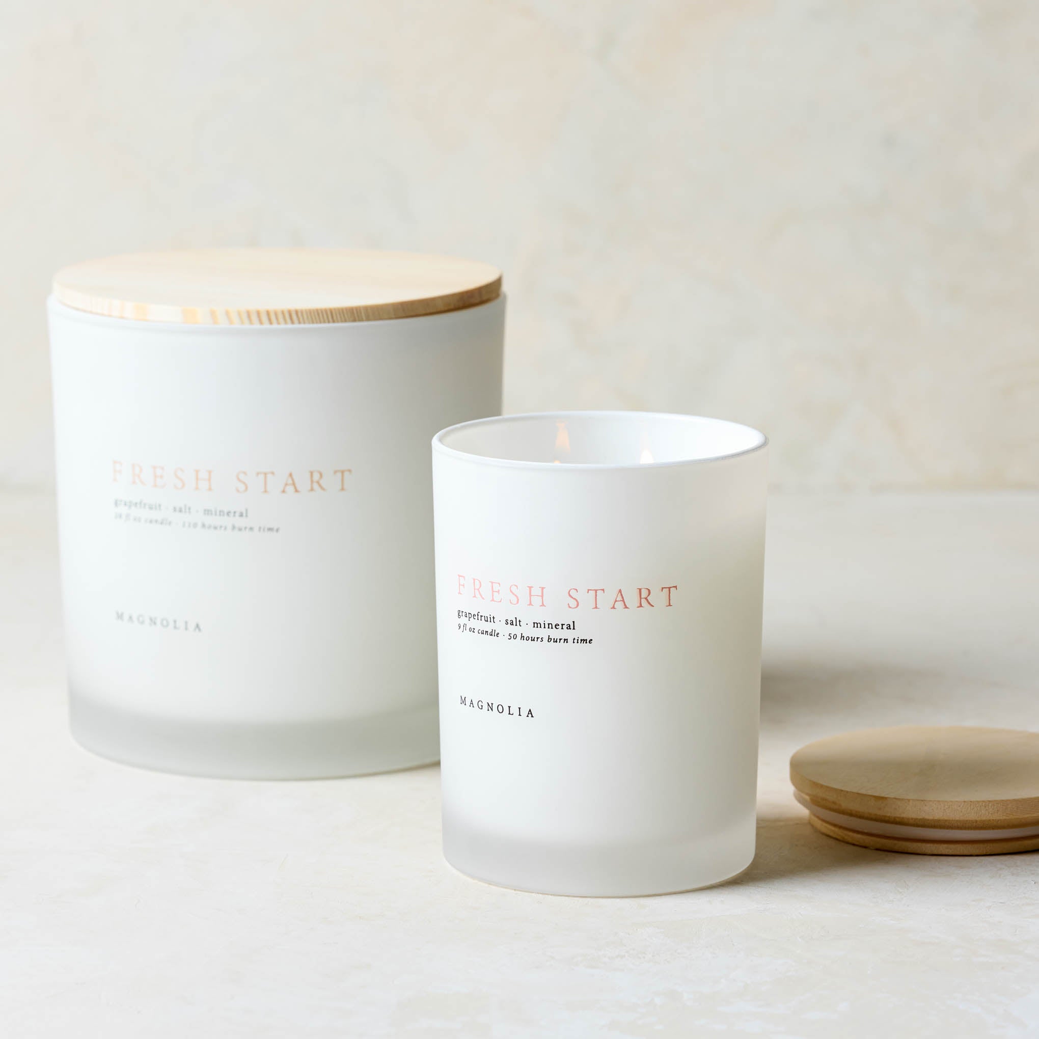magnolia fresh start candle with wood lid notes scents of grapefruit salt and mineral Items range from $30.00 to $58.00