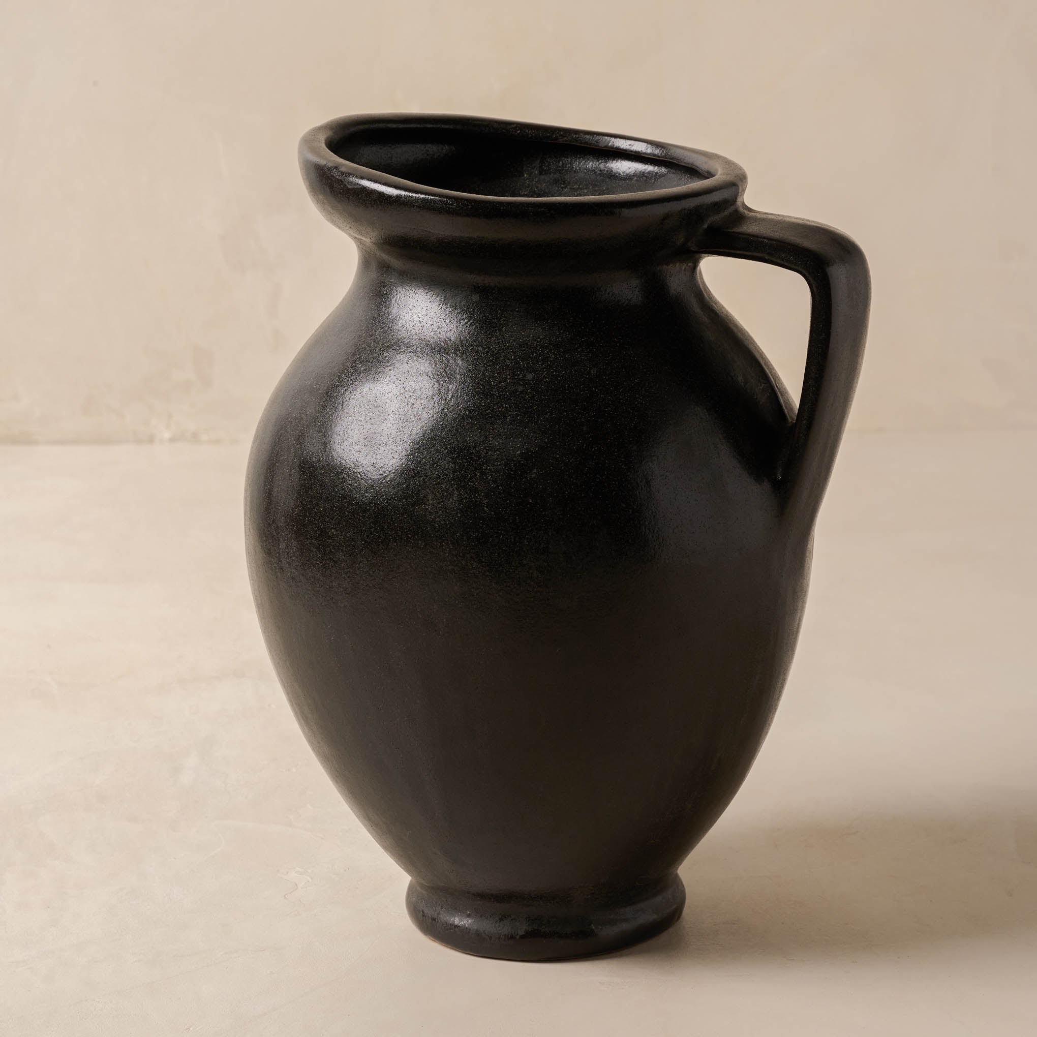 Marcel Distressed Black Ceramic Vase with Handle On sale for $29.99, discounted from $62.00
