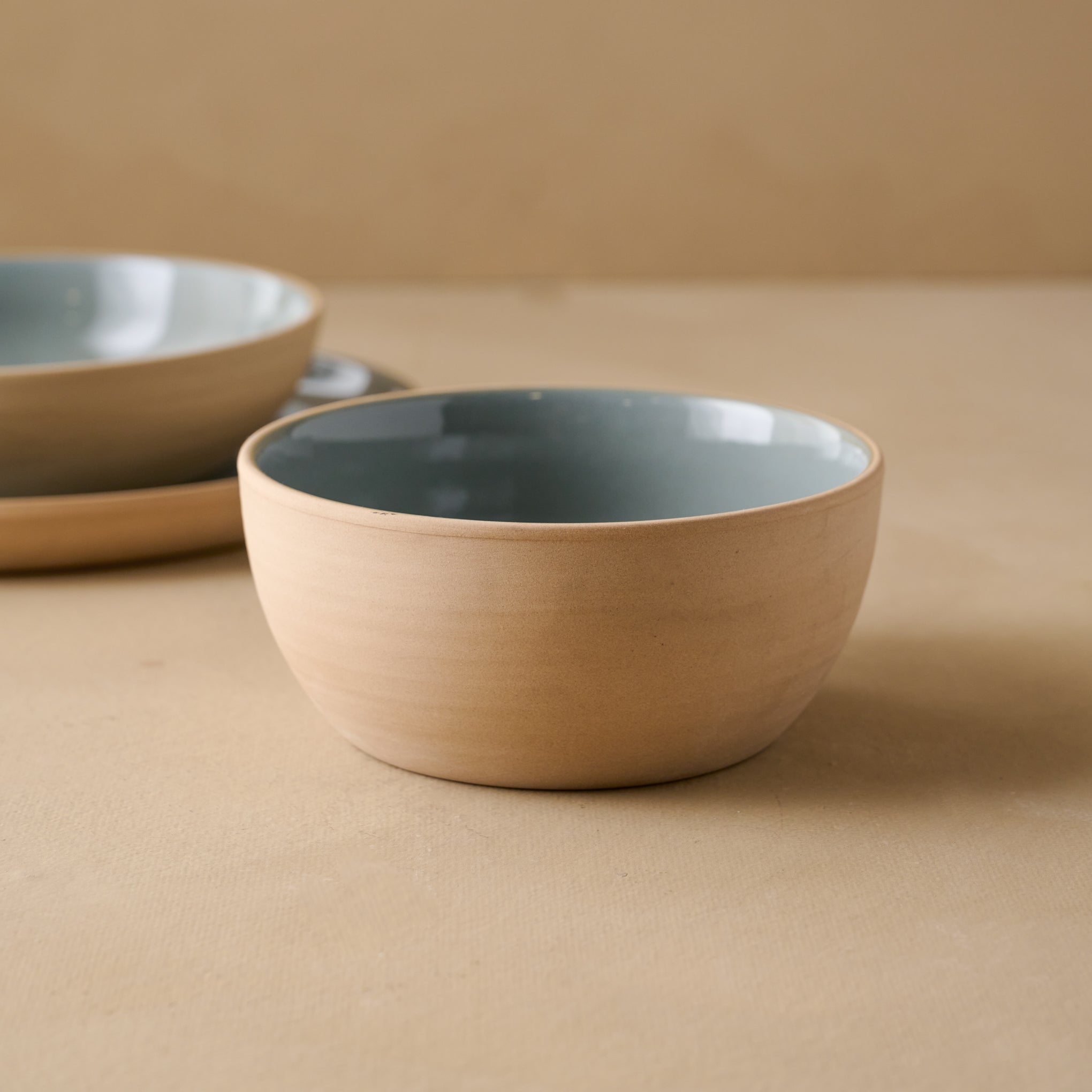 Lakelynn Cereal Bowl with blue glazed interior and tan exterior $14.00