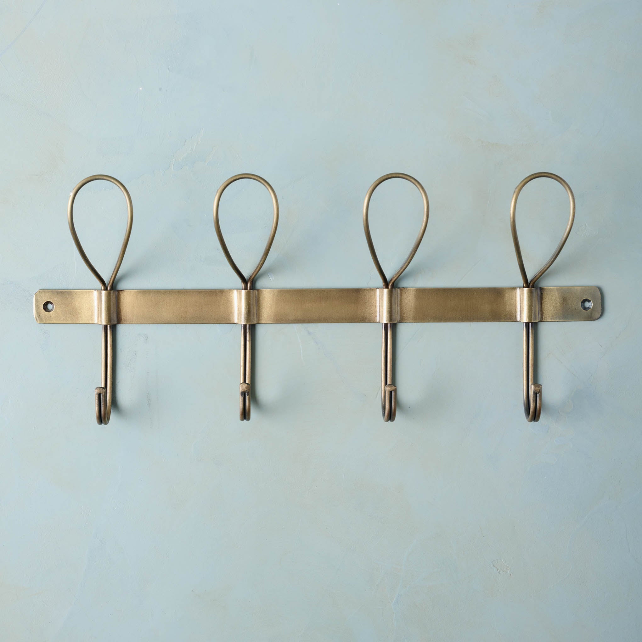 Reed Antiqued Brass Wall Hook long On sale for $24.99, discounted from $38.00