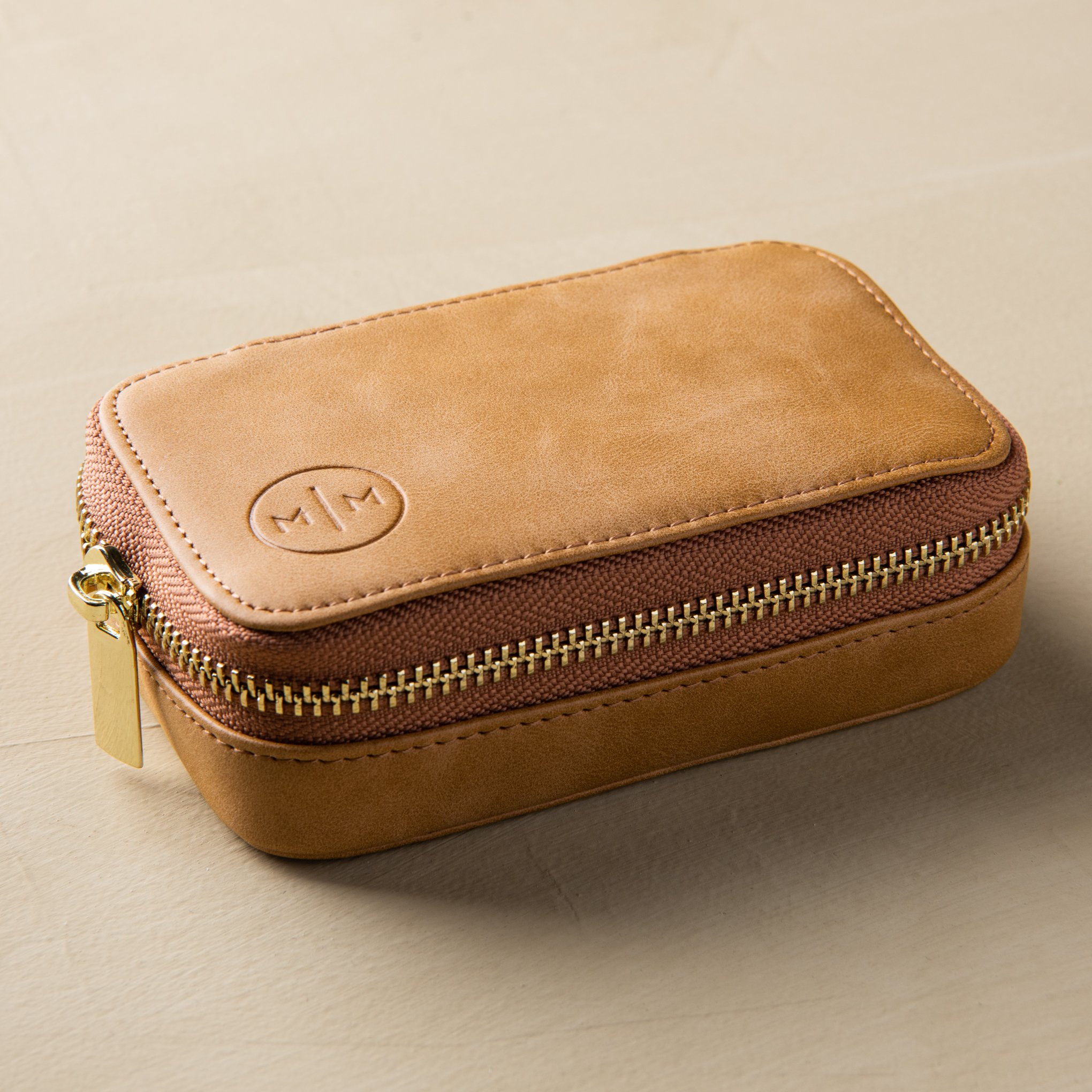 light brown leather zip-up portable jewelry case $80.00