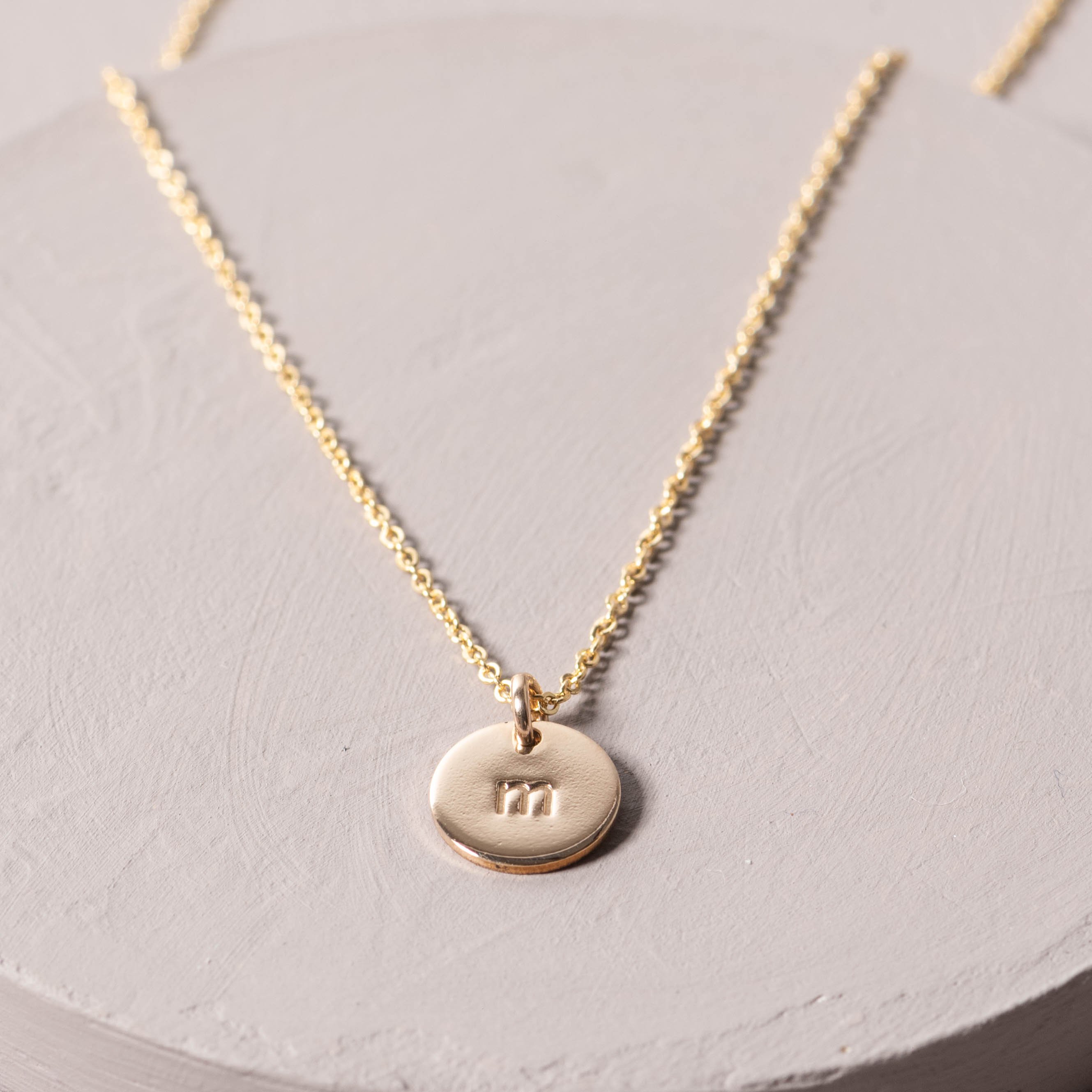 magnolia gold initial disc necklace