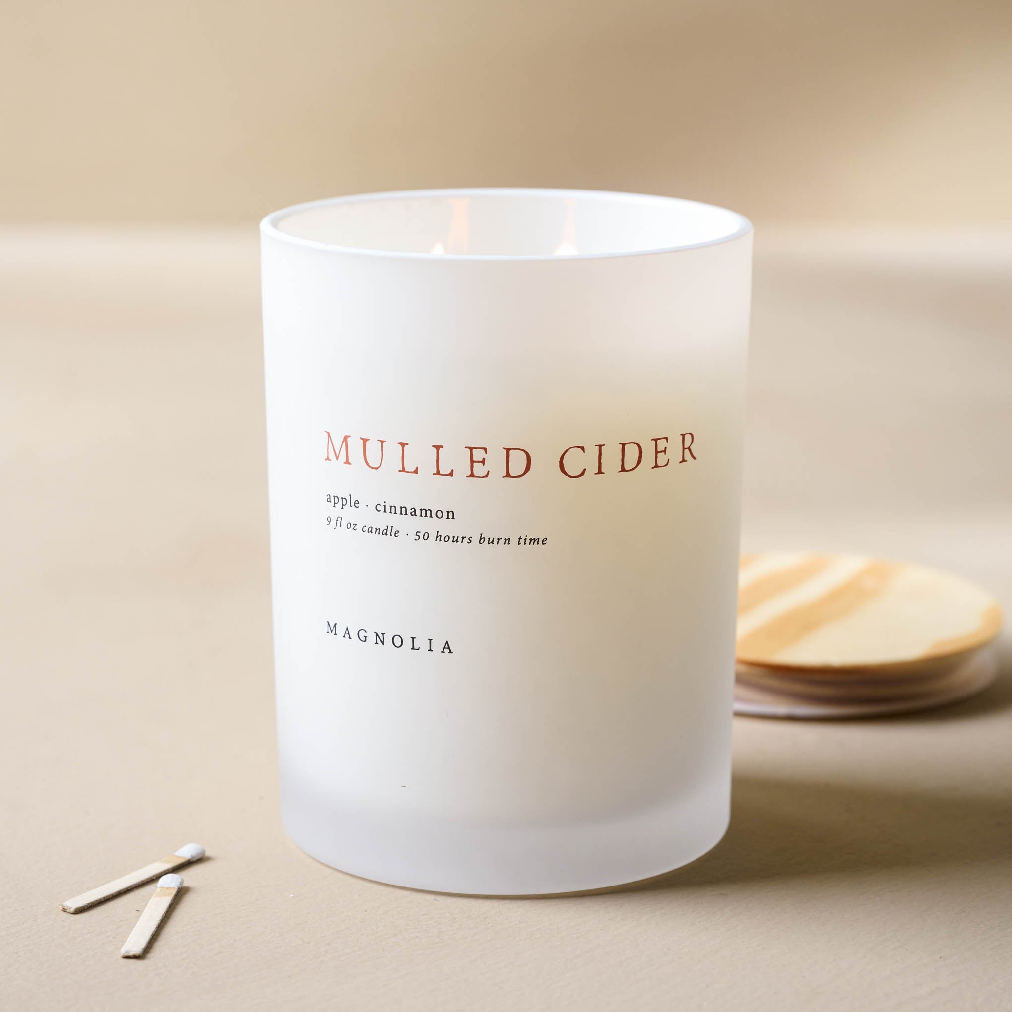 Magnolia Mulled Cider Candle On sale with items ranging from $19.99 to $29.99, discounted from $30.00 to $58.00