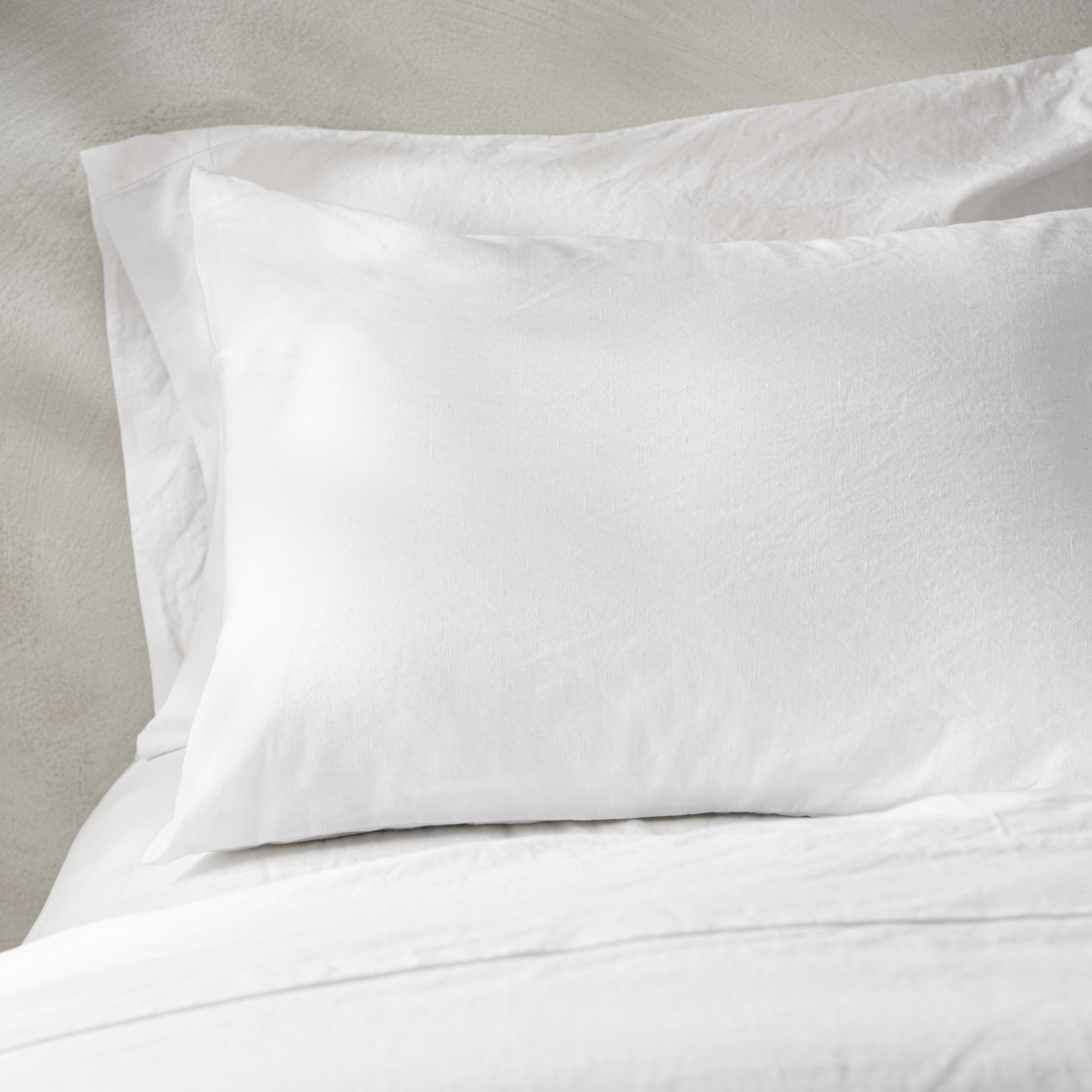 magnolia linen cotton pillow sham bedding in white On sale with items ranging from $24.99 to $34.99, discounted from $39.00 to $49.00